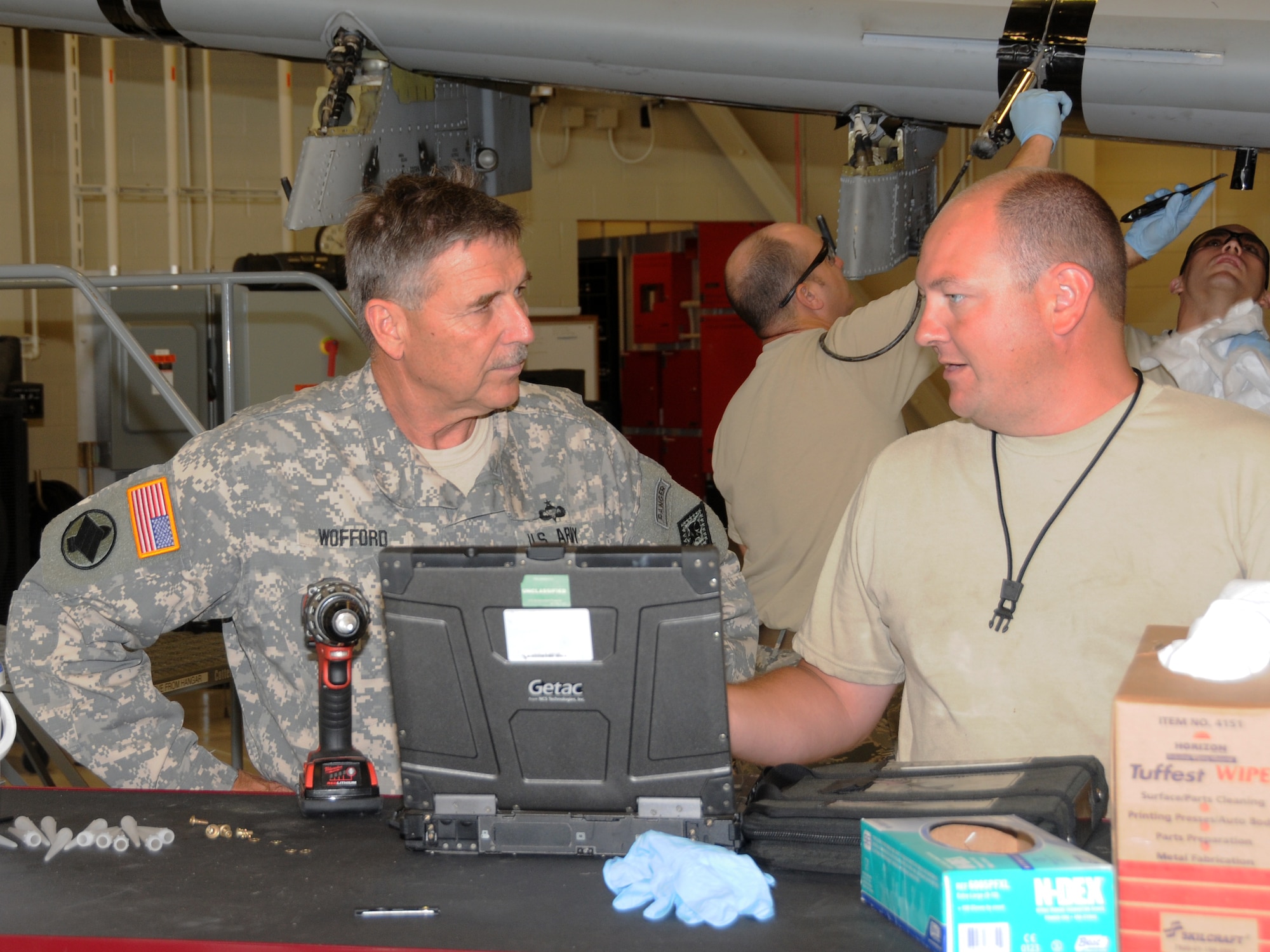 Maj. Gen. William Wofford, Arkansas National Guard adjutant general, visits with members of the 188th Maintenance Squadron July 15 during a command visit to the 188th Fighter Wing. (U.S. Air National Guard photo by Senior Airman John Hillier/188th Fighter Wing Public Affairs))