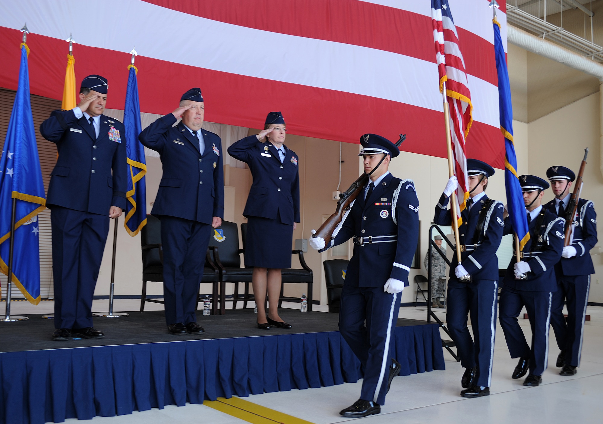 Base Honor Guard preforms the posting of the colors at the 27th Special Operations Mission Support Group change of command July 19, 2013 at Cannon Air Force Base. Col. David Piech relinquished command of the 27 SOMSG to Col. Heather Buono, former Chief of the Test Support Division at Arnold Air Force Base, Tenn. (U.S. Air Force photo/Senior Airman Ericka Engblom)
