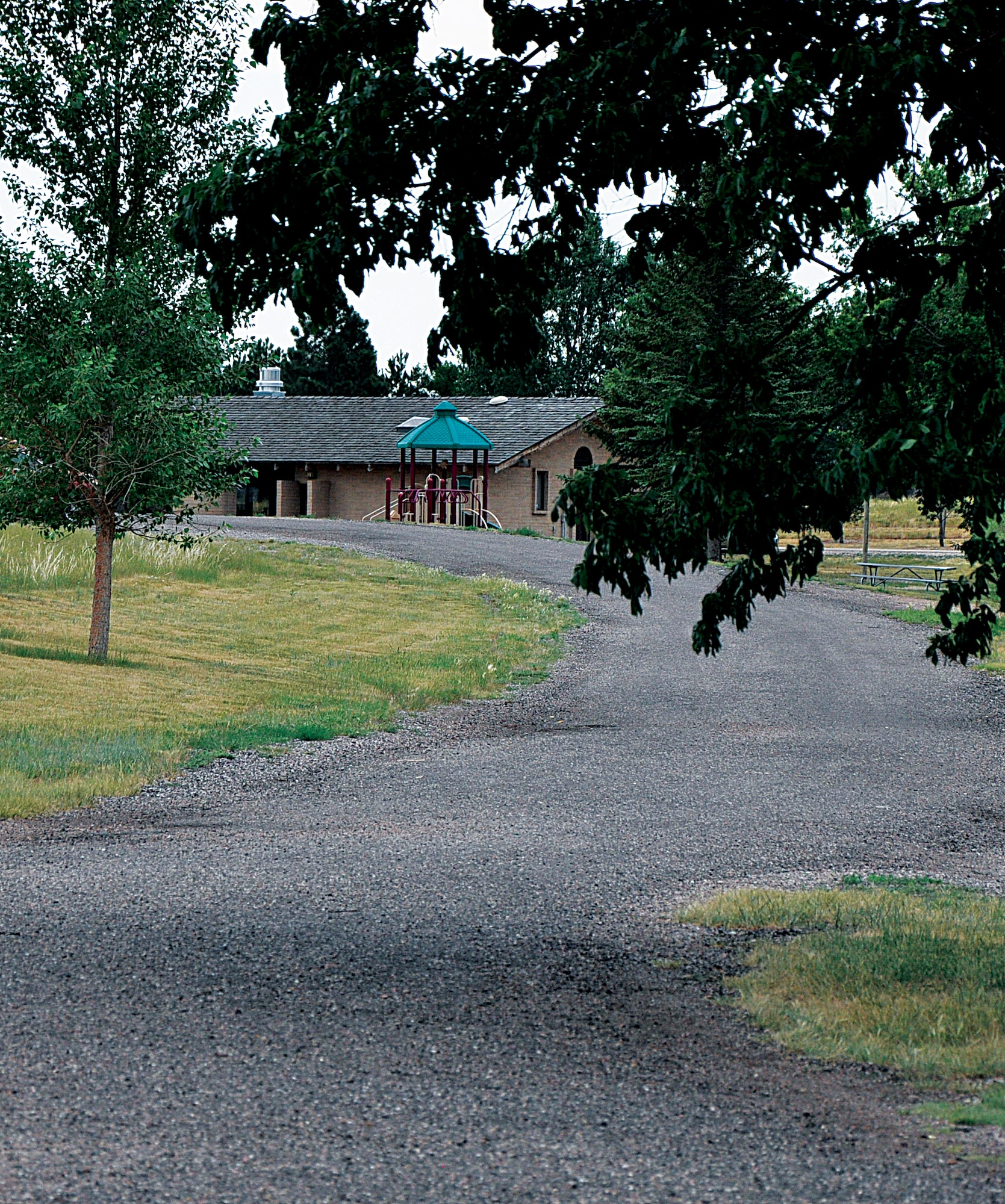 A playground and pavilion can be seen in the distance from the South Pearson Lake’s northern pier. Those with access to the base can use the indoor pavilion and outdoor grill for a fee. For fee information contact Outdoor Recreation at 773-2988. (U.S. Air Force photo by Senior Airman Mike Tryon)