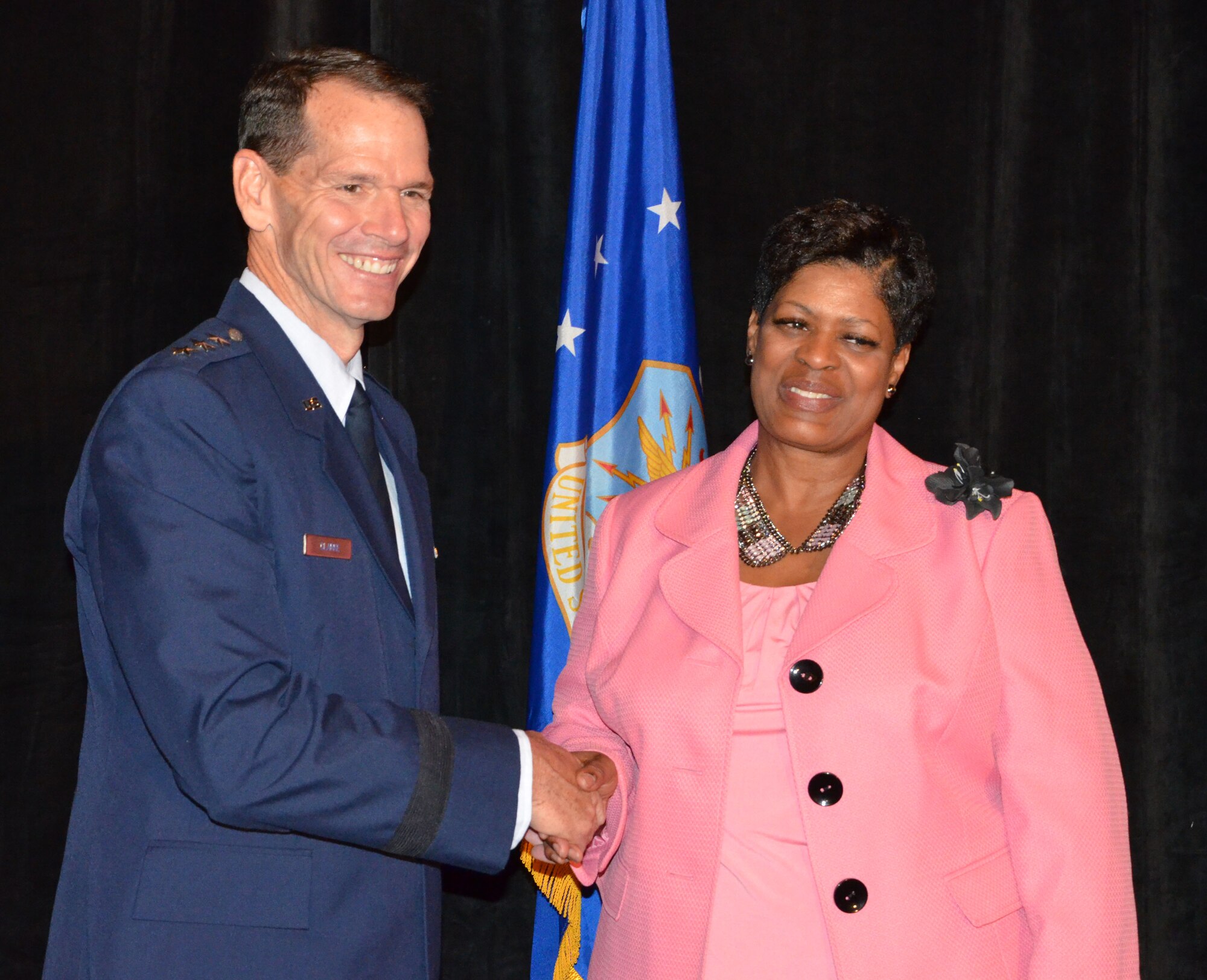 Director of the Air National Guard Lt. Gen. Stanley E. Clarke III (left) congratulates the Benjamin L. Hooks Distinguished Service Award recipient Phyllis Brantley during an Armed Services and Veterans Affairs Awards luncheon in Orlando, Fla., July 16, 2013. Photo by Master Sgt. Thomas Kielbasa