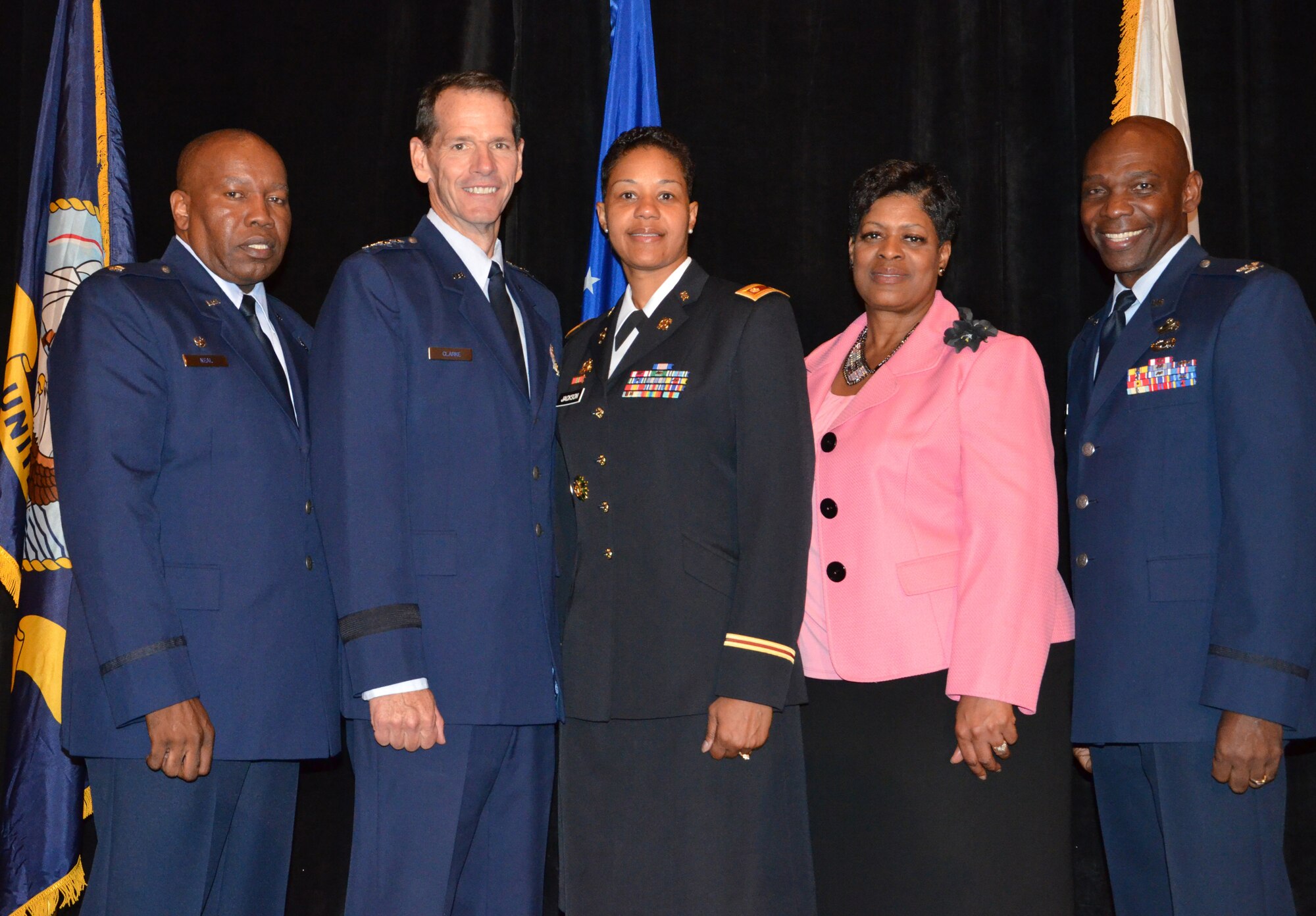 Director of the Air National Guard Lt. Gen. Stanley E. Clarke III (second from left) poses with NAACP award recipients from the National Guard during an Armed Services and Veterans Affairs Awards luncheon in Orlando, Fla., July 16, 2013. Also pictured are Lt. Col. Anderson Neal Jr. (left), Maj. Nathlon Jackson (center), Ms. Phyllis Brantley, and Col. Ondra Berry. Photo by Master Sgt. Thomas Kielbasa