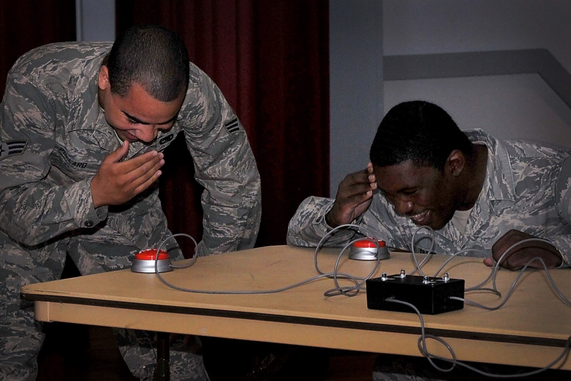 Senior Airman Brandon Pollard, 512th Maintenance Squadron, and Senior Airman Stephen Oliver, 712th Aircraft Maintenance Squadron, participate in a back-to-basics challenge at Dover Air Force Base, Del., July 14, 2013. Some of the basic airmanship competitions in the challenge covered drill movements, aircraft knowledge and general Air Force knowledge, such as chains of command, Air Force song and Airman’s Creed. (U.S. Air Force photo/Senior Airman Joe Yanik)
