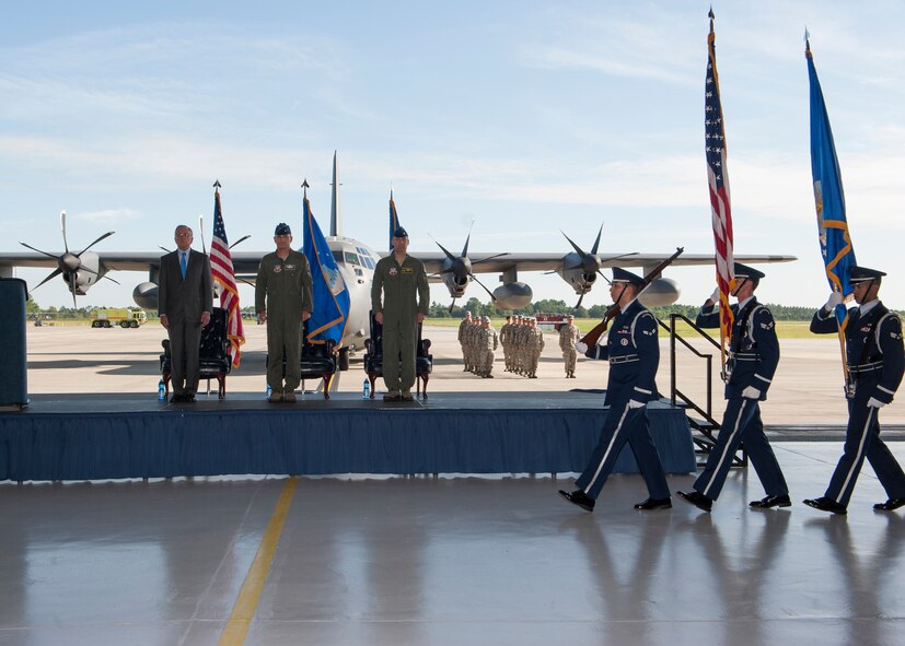 Members of Team Moody and other distinguished visitors observe the Honor Guard present the colors for the singing of the national anthem during the arrival ceremony of the 23d Wing’s first HC-130J Combat King II at Moody Air Force Base, Ga., July 19, 2013. Eight more HC-130J models will arrive at Moody and will replace the current HC-130P Combat King, which has been in service for more than fifty years. (U.S. Air Force photo by Senior Airman Eileen Meier/Released)