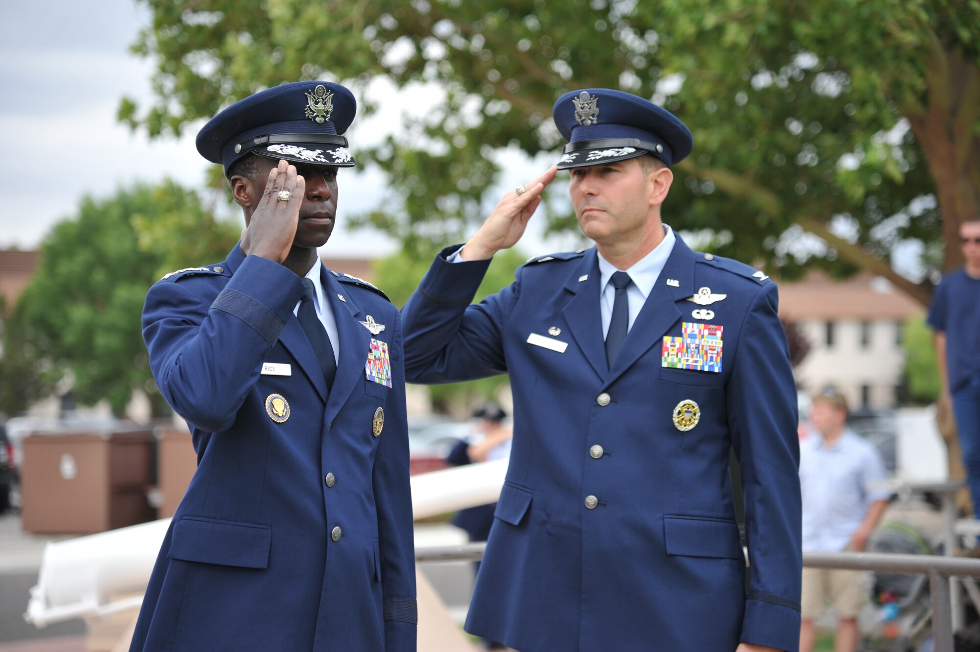 Gen. Edward Rice Jr., Air Education and Training Command commander, and Col. Vincent Becklund, 58th Special Operations Wing commander, salute at a special remembrance and retreat ceremony July 15 at Hardin Field. More than 1,200 members of the 58th SOW stood in formation at the event, which honored the 40 fallen Airmen who lost their lives while assigned to the wing since Sept. 11, 2001. (Photo by Ken Moore) 