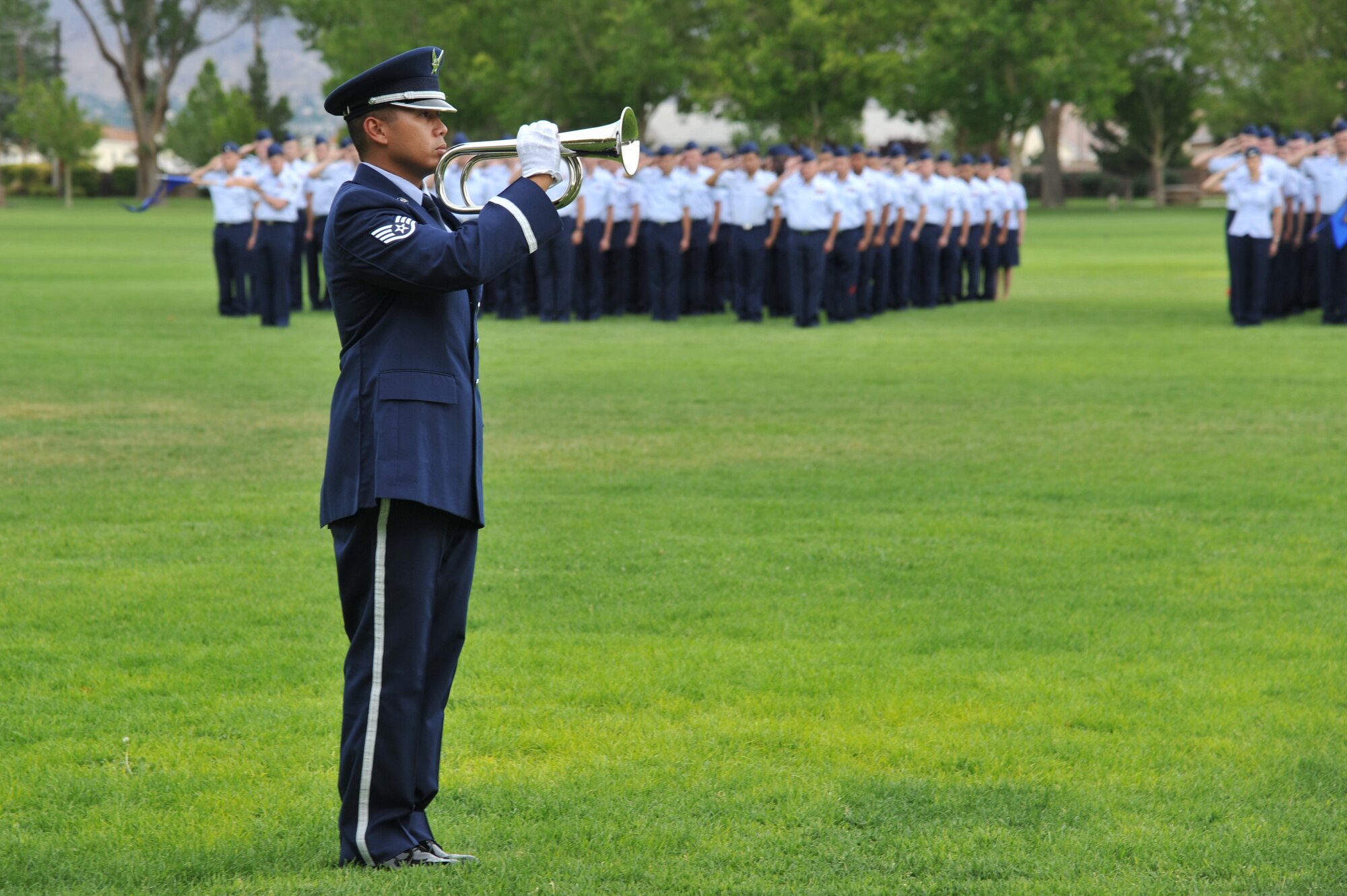 A special remembrance and retreat ceremony July 15 at Hardin Field included the playing of Taps. About 900 members of the 58th Special Operations Wing stood in formation at the event, which honored the 40 fallen Airmen who lost their lives while assigned to the wing since Sept. 11, 2001. (Photo by Ken Moore) 