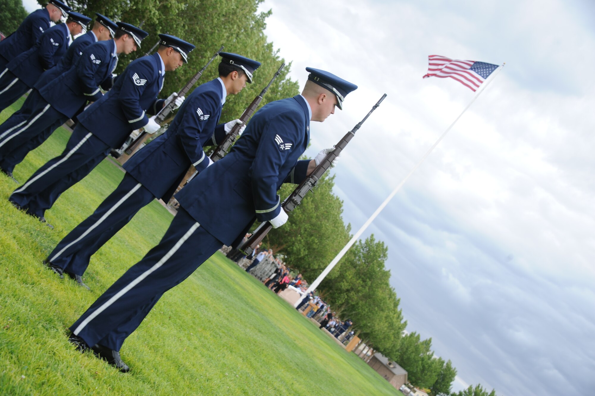 A special remembrance and retreat ceremony July 15 at Hardin Field included a rifle volley salute. About 900 members of the 58th Special Operations Wing stood in formation at the event, which honored the 40 fallen Airmen who lost their lives while assigned to the wing since Sept. 11, 2001. (Photo by Todd Berenger) 
