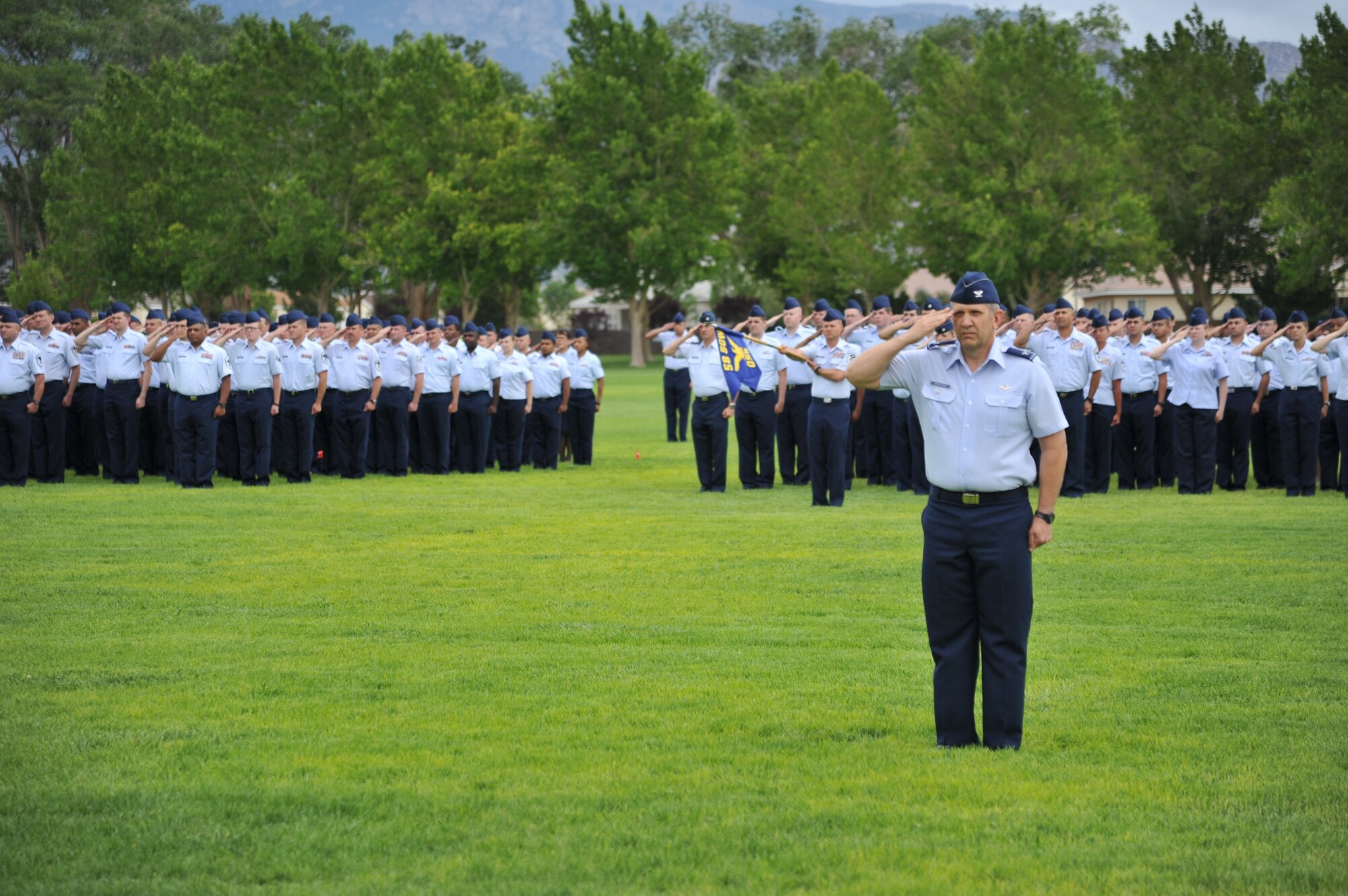 About 900 members of the 58th Special Operations Wing stood in formation to honor their fallen comrades during a remembrance and retreat ceremony July 15 at Hardin Field. The event honored 40 fallen Airmen who lost their lives while assigned to the wing since Sept. 11, 2001. (Photo by Ken Moore) 