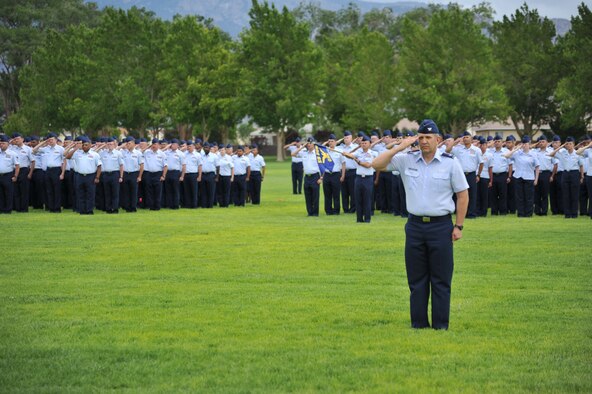 About 900 members of the 58th Special Operations Wing stood in formation to honor their fallen comrades during a remembrance and retreat ceremony July 15 at Hardin Field. The event honored 40 fallen Airmen who lost their lives while assigned to the wing since Sept. 11, 2001. (Photo by Ken Moore) 