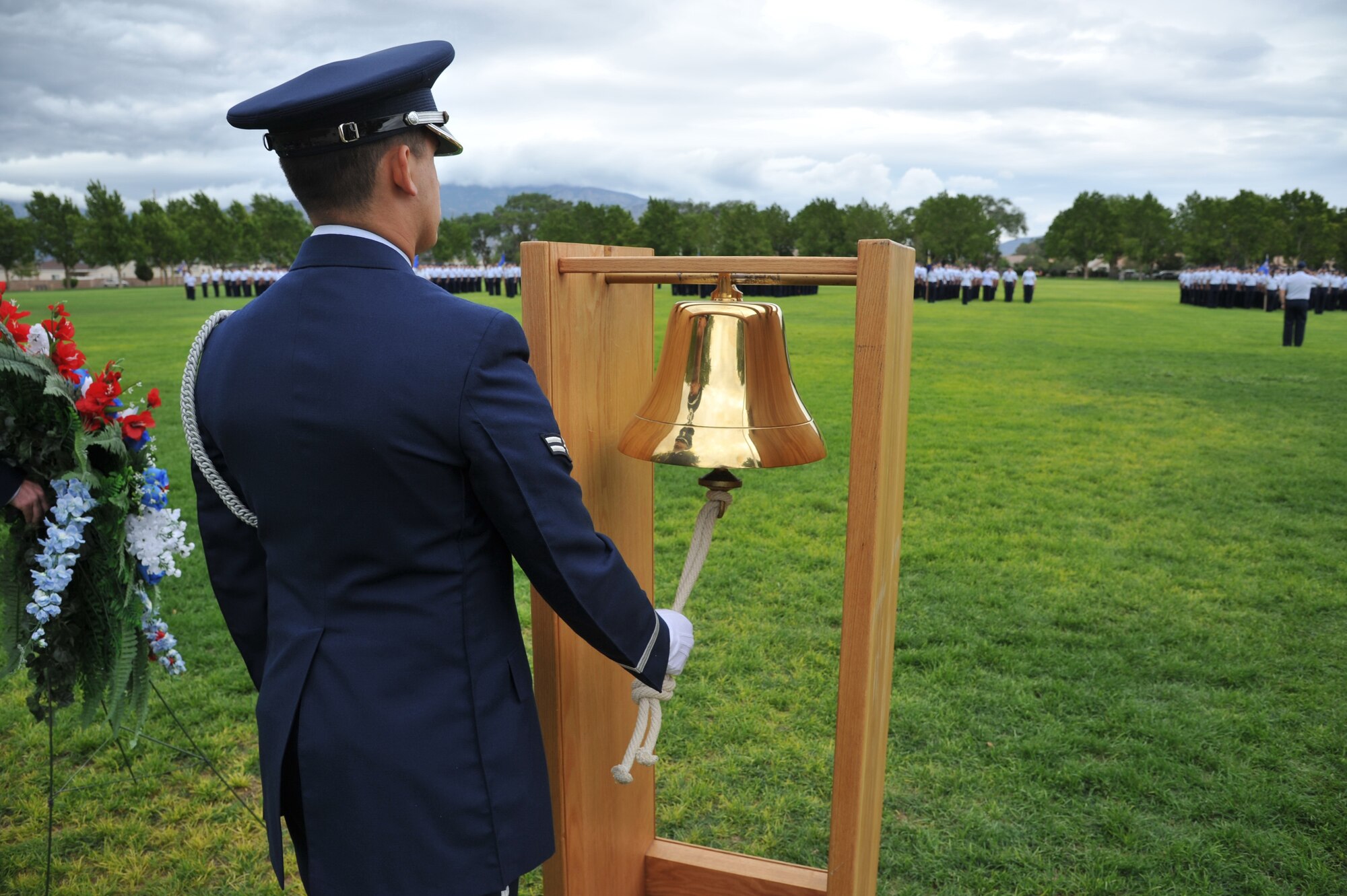 A bell tolled 40 times, honoring the 40 fallen Airmen who lost their lives while assigned to the 58th Special Operations Wing since Sept. 11, 2001, at a remembrance and retreat ceremony July 15 at Hardin Field. (Photo by Ken Moore) 