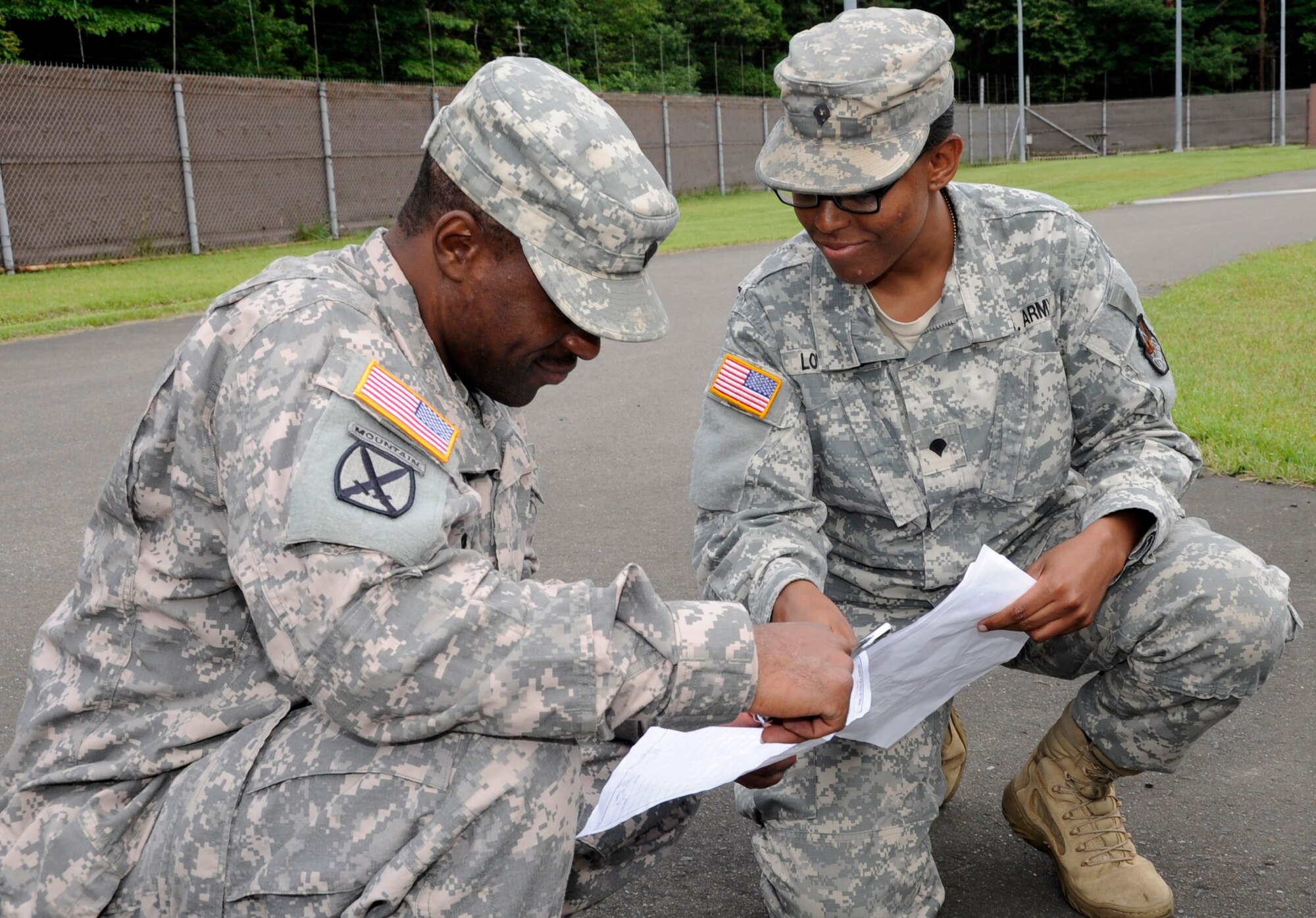 U.S. Army Spc. Ahmed Boyd, Delta Detachment 1st Base Company Joint Tactical Ground Station mechanic, left, and Spc. Miaarka Loveless, Delta Detachment 1st Base Company JTAGS detachment supply sergeant, inventory tools and equipment used to repair Humvees at Misawa Air Base, Japan, July 17, 2013. It is a high priority for JTAGS to remain mobile and keeping vehicle standards up to date requires teamwork from both Loveless and Boyd. (U.S. Air Force photo by Airman 1st Class Kaleb Snay)