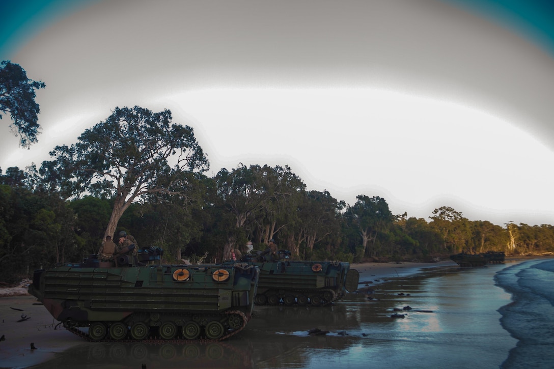 Marines and Sailors with Company G., Battalion Landing Team 2nd Battalion, 4th Marines, 31st Marine Expeditionary Unit, land in Amphibious Assault Vehicles during the initial stages of exercise Talisman Saber  2013 here, July 20. Company G. served as the MEU’s initial ground forces by securing a beach landing site and a nearby airfield. Talisman Saber 2013 is a biennial training exercise between approximately 18,000 joint U.S. forces and approximately 9,000 Australian forces, aimed at improving combat readiness and interoperability. The 31st MEU is the Marine Corps’ force in readiness for the Asia Pacific region and the only continuously forward-deployed MEU.