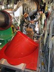 Master Sgt’s. Lamont Wood and Scott Agenbroad from the Air Force Reserve Command's 302nd Airlift Wing based at Peterson AFB, Colo., ready their cargo of Modular Airborne Fire Fighting System equipment for transport to Kirtland Air Force Base, N.M., to assist the wildfire fighting effort across Arizona and New Mexico.
