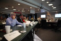 Military and civilian Defense Support of Civil Authorities, or DSCA, planners listen to a presentation on the National Response Framework, part of the National Strategy for Homeland Security, which explains the principles of domestic response during a DSCA operation held aboard Camp Lejeune, N.C., July 18, 2013. Members involved in various aspects of DSCA spoke about the roles each involved organization or unit has to offer in the case of a state or national crisis.