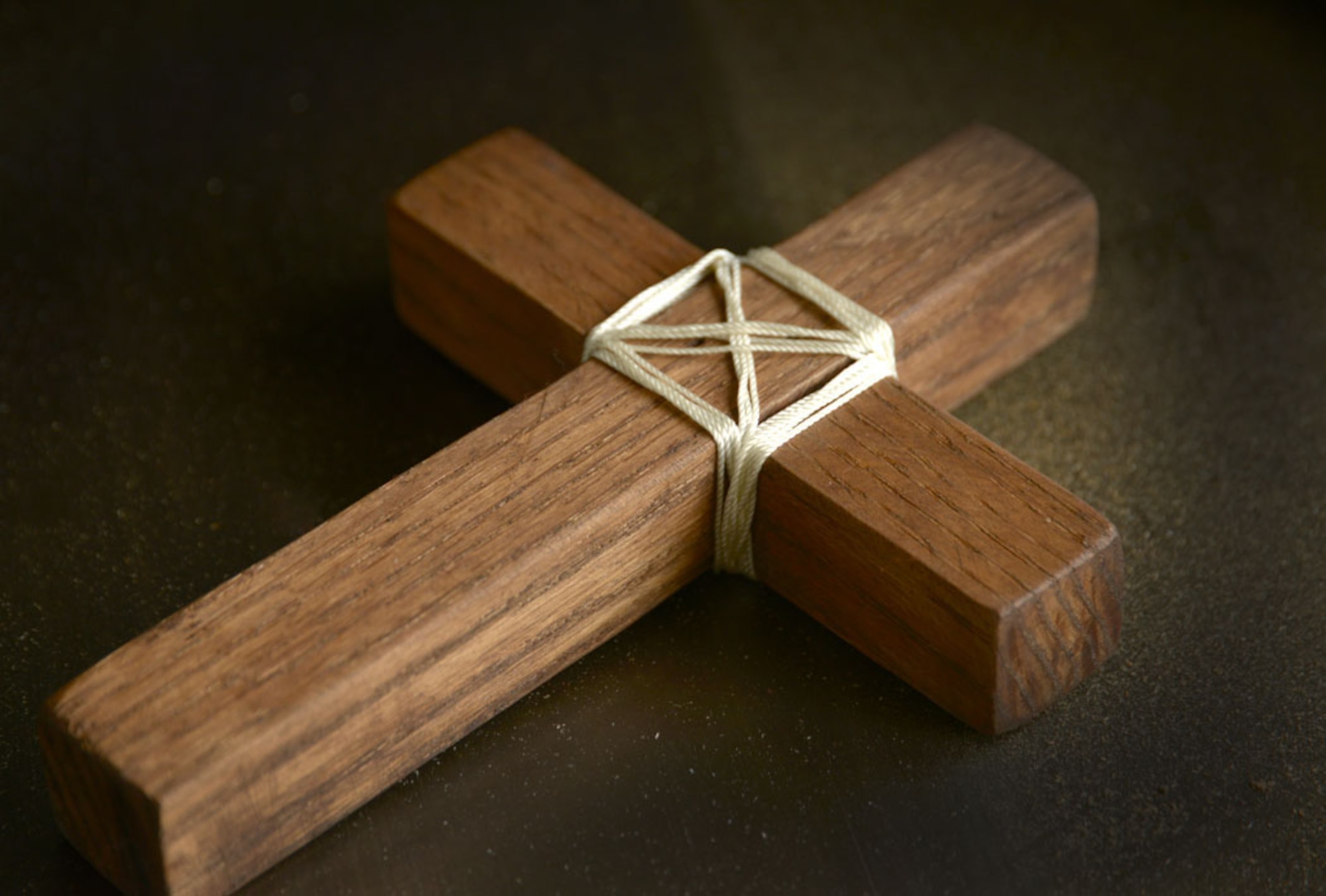 U.S. Air Force Staff Sgt. Eric Gargus, 18th Civil Engineer Squadron structural craftsman, made the pictured cross in his spare time. Gargus recently returned from an impact trip to Thailand where he used his craft to build a playground for a children's home. (U.S. Air Force photo by Tech Sgt. Jocelyn L. Rich-Pendracki/Released) 