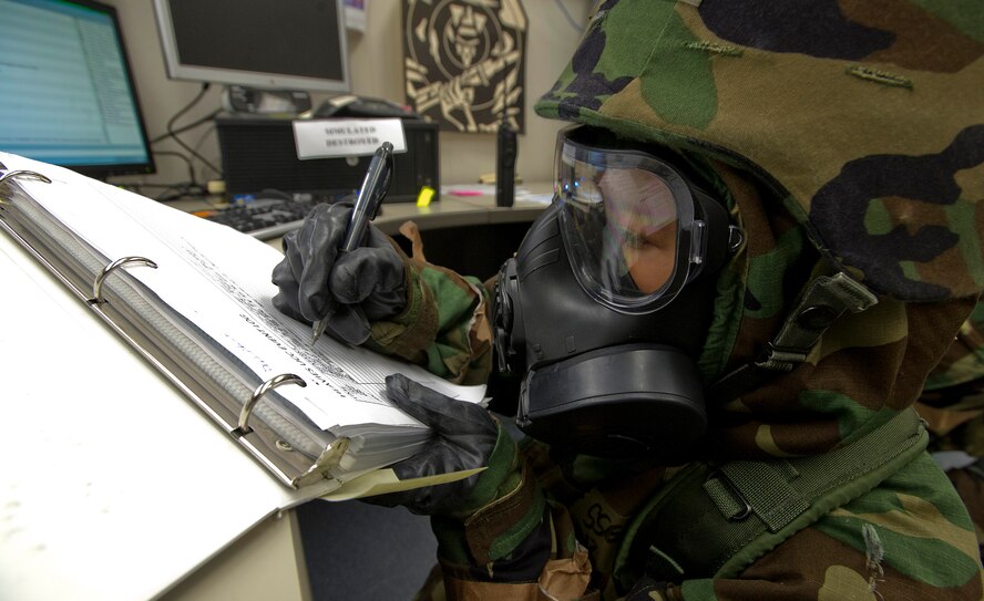 Staff Sgt. Ivy Cadiz, 154th Wing Hawaii Air National Guard Aircraft Maintenance Squadron knowledge operations management, tracks exercise measures in an events log at Hangar 13 during an Operational Readiness Exercise at Joint Base Pearl Harbor-Hickam, Hawaii, July 18, 2013.  (U.S. Air Force photo/Tech. Sgt. Jerome S. Tayborn)