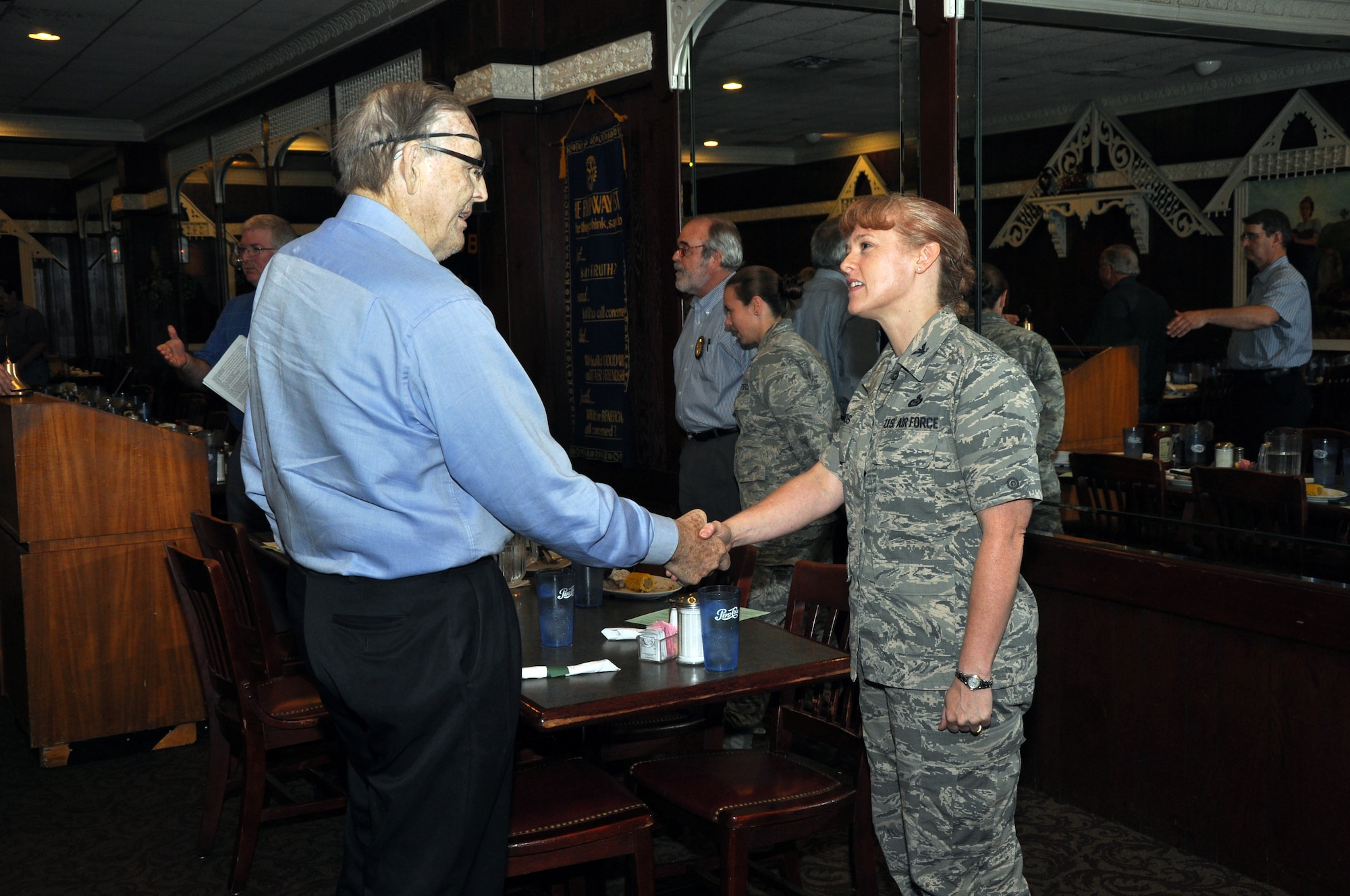 SAN ANGELO, Texas – Barry Rountree, San Angelo Rotary Club member, introduces himself to Col. Kimberlee Joos, 17th Training Wing Commander, after her speech for the rotary club meeting at Zenter’s Daughter Steak House, July 19. Col. Joos participated in the meeting to introduce herself to the community and talk about what has been happening at Goodfellow Air Force Base. (U.S. Air Force photo/ Airman 1st Class Joshua Edwards)