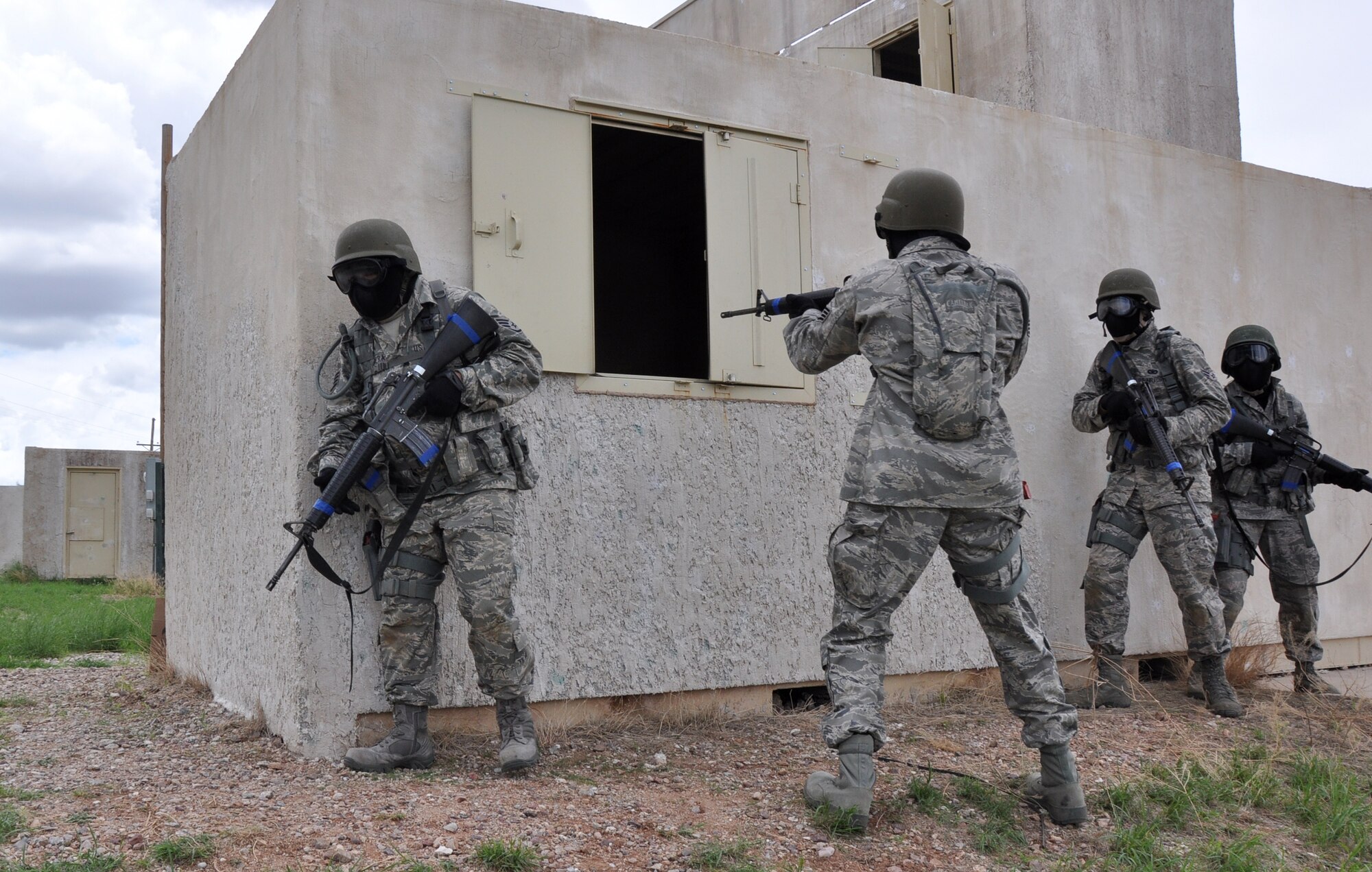 Airmen from the 920th Mission Support Group Detachment One, Security Forces from Davis Monthan Air Force Base practice urban police and warfare tactics at Fort Huachuca, Ariz. The hands-on training was the first ever unit training evolution for the newest Reserve security forces squadron at Davis Monthan AFB. (U.S. Air Force Photo/Master Sgt. Luke Johnson) 