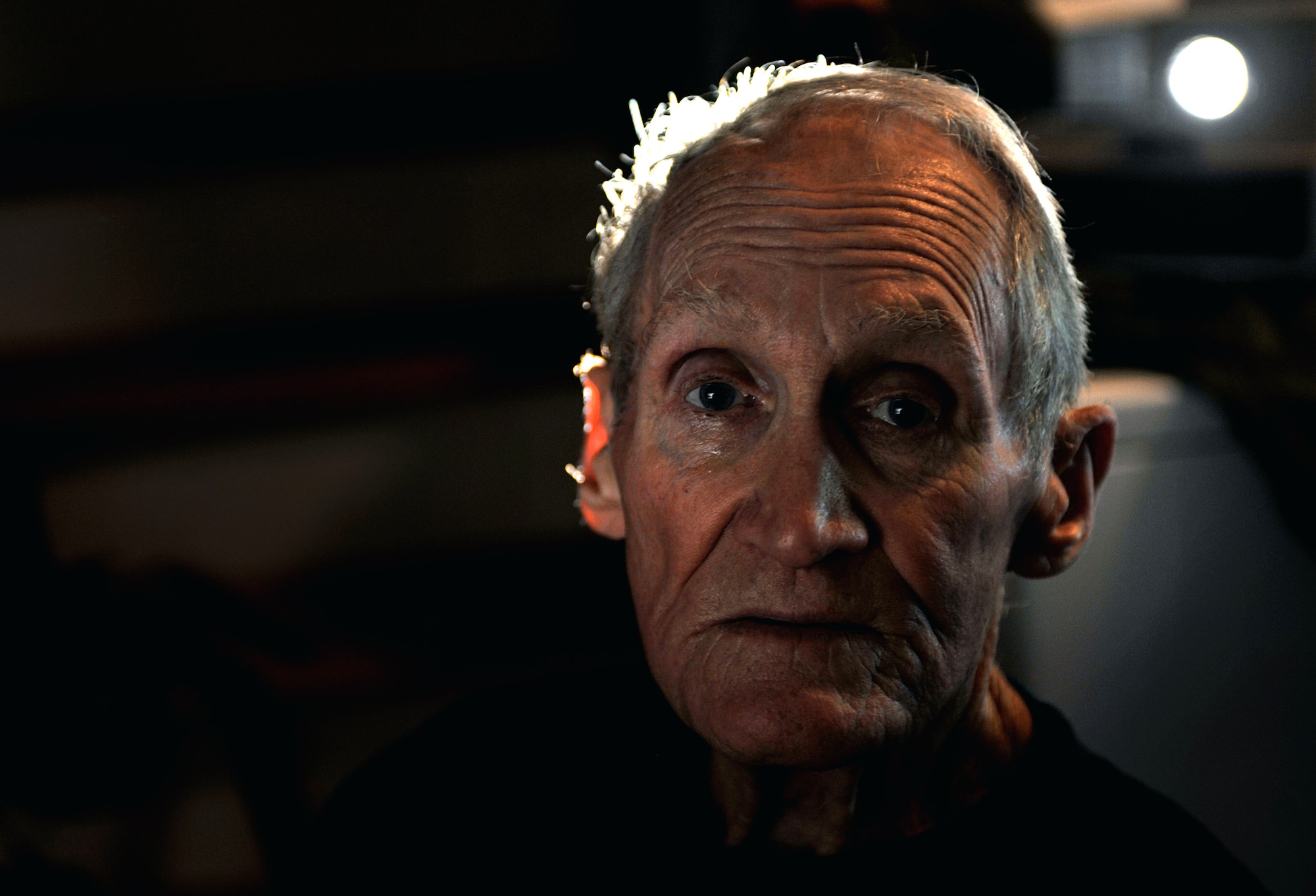 Retired U.S. Army Maj. E. Vernon Smith Jr. was stationed roughly 15 miles south of the 38th parallel in Korea as part of the Korean Armistice Agreement signed July 27, 1953, ending the war between North and South Korea. Now, 60 years later, he finds meaning in the keepsakes he received and photographs he took during his 16-month rotation in Korea, preserving memories of his experience during a significant time in military history. (U.S. Air Force photo by Staff Sgt. Katie Gar Ward/Released) 