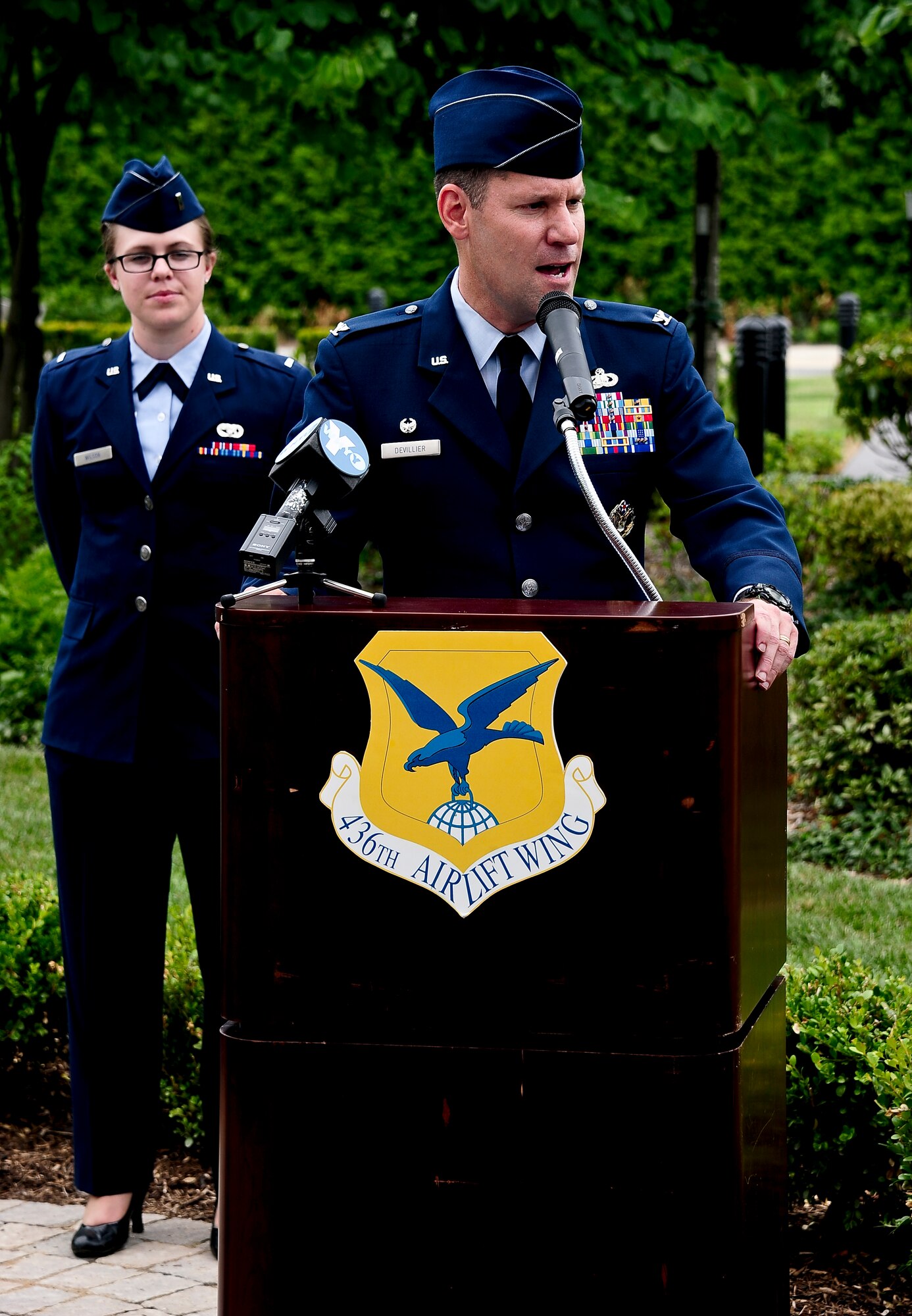 Col. John Devillier, Air Force Mortuary Affairs Operations commander, speaks during an unveiling ceremony of a veteran memorial sculpture named The Angel and the Dying Unknown at Dover Air Force Base, Del., July 22, 2013. Greg Wyatt created the bronze sculpture and the Newington-Cropsey Foundation, an organization that focuses on preserving and displaying art, donated the piece.  (U.S. Air Force photo by Senior Airman Melanie Bulow-Kelly/Released) 