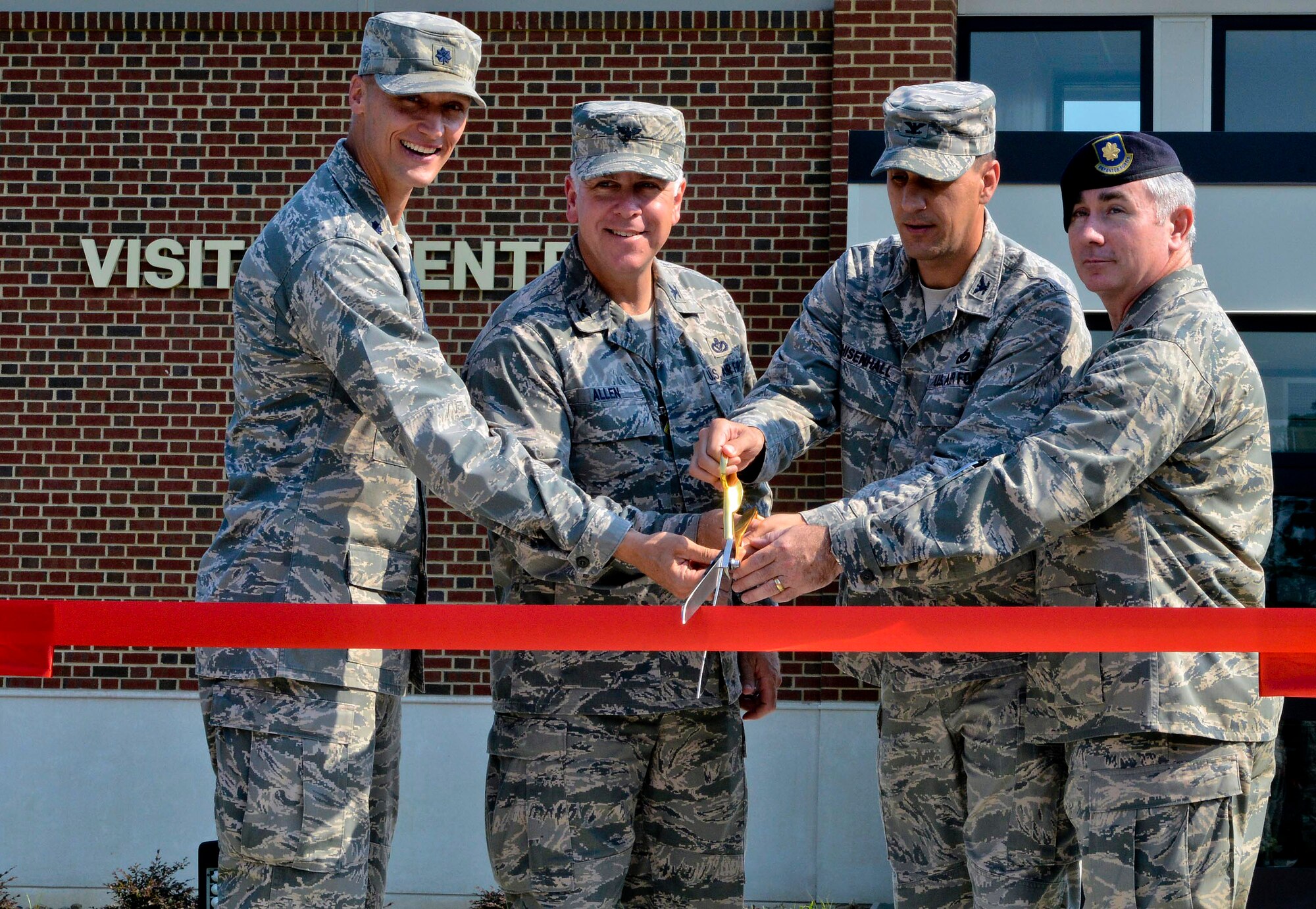 Senior U.S. Air Force leaders from the 633rd Air Base Wing officially opened the newly-constructed LaSalle Avenue Gate at a ribbon cutting ceremony at Langley Air Force Base, Va., July 19, 2013. The LaSalle Gate renovation was the second and final phase of recent construction efforts, and now boasts three inbound and two outbound traffic lanes, an inspection station and a newly-constructed Visitors’ Center with an extended parking lot. (U.S. Air Force photo by Airman 1st Class R. Alex Durbin/ Released)