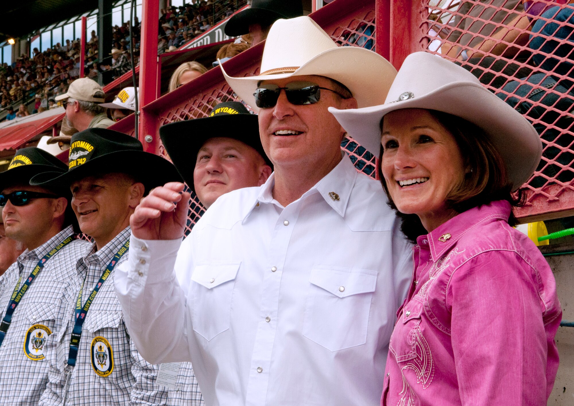 Air Force Chief of Staff Gen. Mark A. Welsh III and his wife, Betty, enjoy scenes from the 117th annual Cheyenne Frontier Days rodeo July 20, 2013, held in Frontier Park, Cheyenne, Wyo. Welsh, who served as grand marshal for the opening parade, visited the region to participate in CFD events, but also to thank Airmen and the community for the continued service and support. (U.S. Air Force photo by R.J. Oriez)