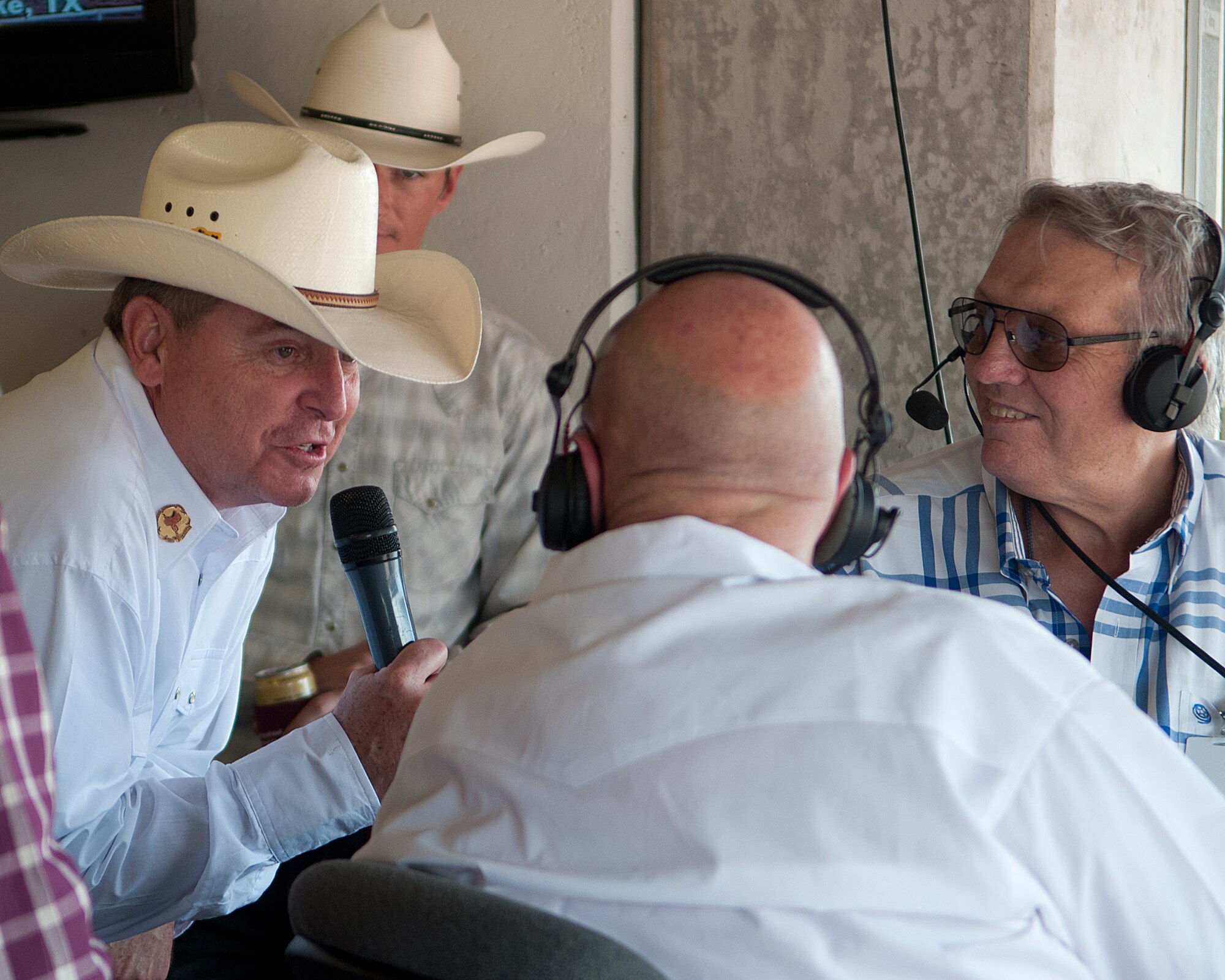 Air Force Chief of Staff Gen. Mark A. Welsh III participates in a radio interview during a rodeo event held in Frontier Park, Cheyenne, Wyo., July 20, 2013, during the 117th annual Cheyenne Frontier Days. Welsh, who served as grand marshal for the opening parade, visited the region to participate in CFD events, but also to thank Airmen and the community for the continued service and support. (U.S. Air Force photo by R.J. Oriez)