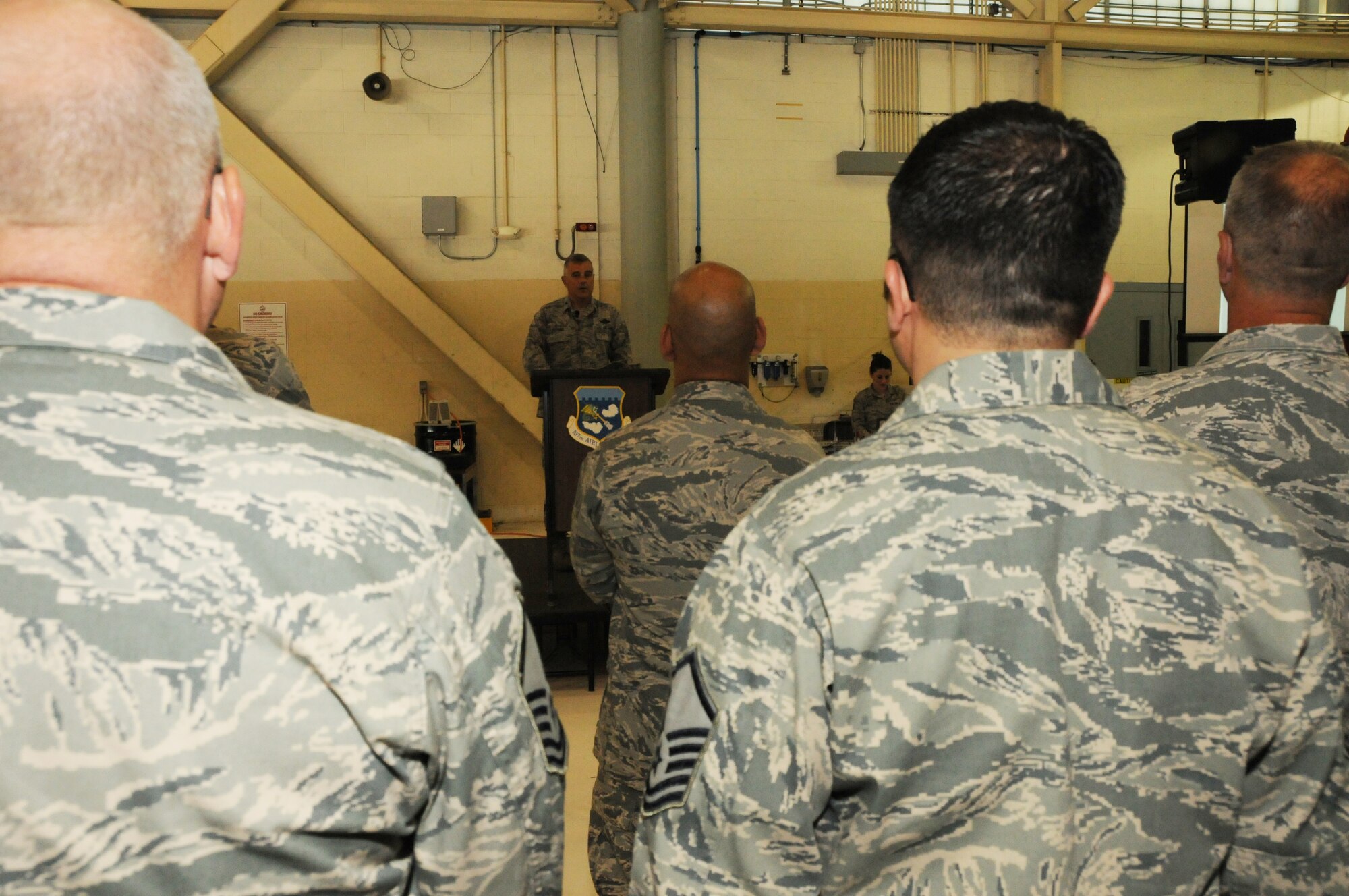 Col. John Higgins, 107th Airlift Wing Commander, addressed the men and women of the 107th.  The stand-down was a temporary stoppage of operations to focus on eliminating sexual assault in the Armed Forces, an initiative directed by the Secretary of Defense. July 21, 2013 (Air National Guard Photo/ Senior Airmen Daniel Fravel)