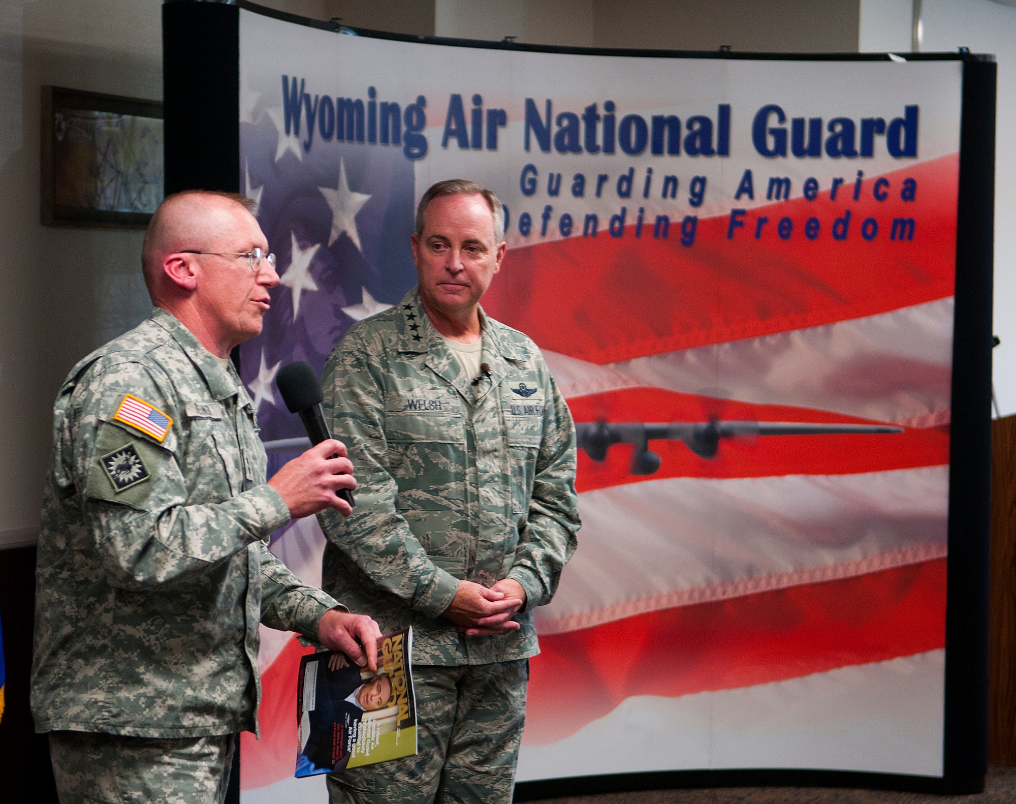 Maj. Gen. Luke Reiner, Wyoming's adjutant general, thanks Air Force Chief of Staff Gen. Mark A. Welsh III during his visit to the Wyoming Air National Guard, July 19, 2013. During the visit, Welsh applauded the 153rd Airlift Wing's role in hosting the Air National Guard's first active duty associate unit, the 30th Airlift Squadron, as well as their contributions to ongoing firefighting efforts. He spoke about the important role each component plays in enabling airpower for the nation, while also addressing key issues affecting the service — like sequestration, furlough and sexual assault prevention response efforts. (U.S. Air Force photo by R.J. Oriez)