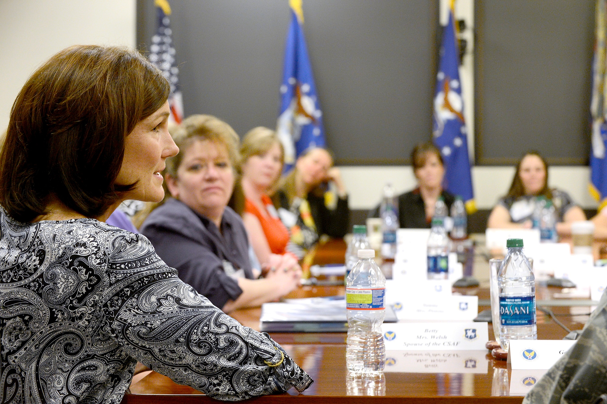 Betty Welsh, wife of Air Force Chief of Staff Gen. Mark A. Welsh III, discusses the importance of key spouses during a meeting with wing leadership and spouses July 19, 2013, at Schriever Air Force Base. As part of a two-day visit to Colorado Springs, the chief and his wife thanked Airmen for their continued service and dedication, and addressed issues concerning Airmen and their families. (U.S. Air Force photo/Scott Ash)