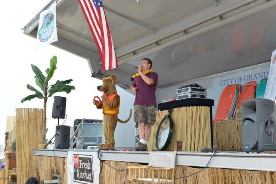 The Corps of Engineers' Bobber the Water Safety Dog makes a special appearance at this year's Beach Survival Challenge at Grand Haven State Park to stress the importance of wearing personal floatation devices while out on the water.