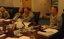 Maj. Gen. Kendall Cox (right), U.S. Army Corps of Engineers Deputy Commanding General – Military and International Operations, addresses U.S. Army Engineering and Support Center, Huntsville  staff  during a briefing July 23. Cox is responsible for policy, programming, and technical support in the execution of over $28 billion of design, construction, and environmental programs for the Army, the Air Force, other Department of Defense and federal agencies and foreign countries.