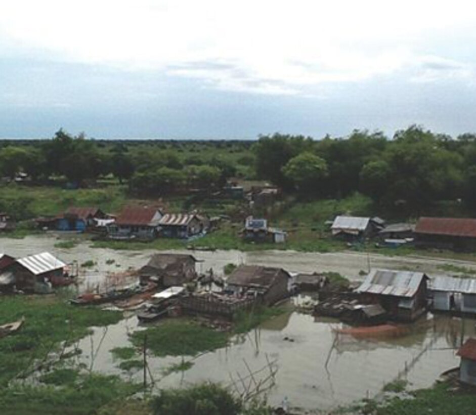 A flooded village along the Mekong. The 2011 flood damaged some 900,000 homes and impacted 8 million people.