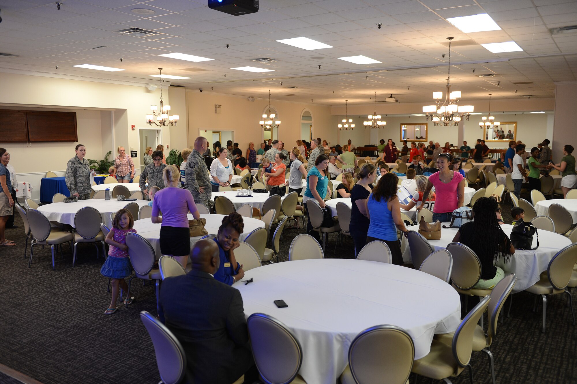 Approximately 100 people attended a deployed spouses dinner at Shaw Air Force Base, S.C., July 22, 2013.  Deployed spouses dinners are held regularly to provide support and encouragement to families of deployed service members. (U.S. Air Force photo by Airman 1st Class Daniel Blackwell/Released)