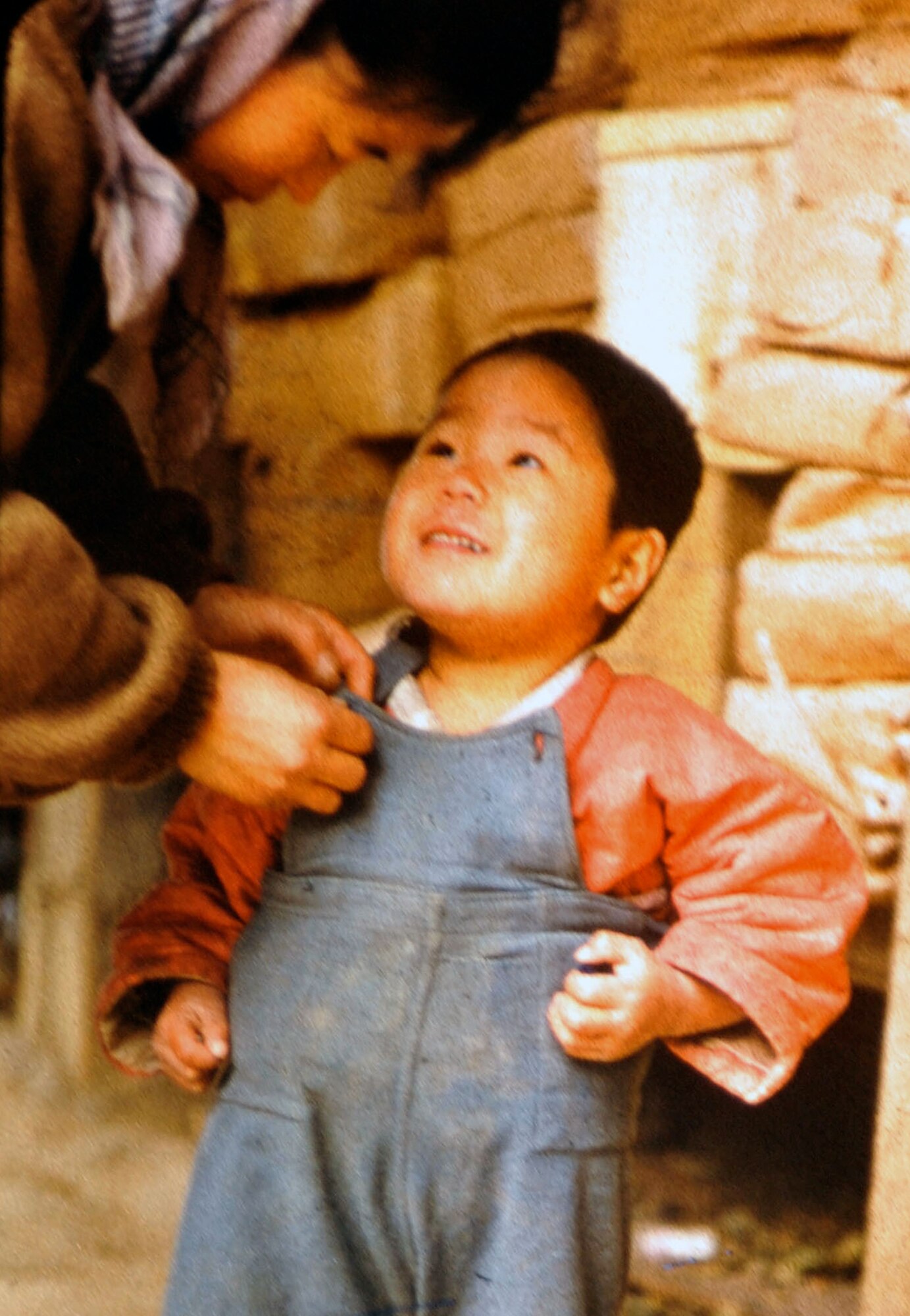 A South Korean child and mother live in an area near the 38th parallel in 1956. Retired U.S. Army Maj. E. Vernon Smith Jr. used photography as a way to preserve memories of his experience during a significant time in military history. (Courtesy photo/Released) 