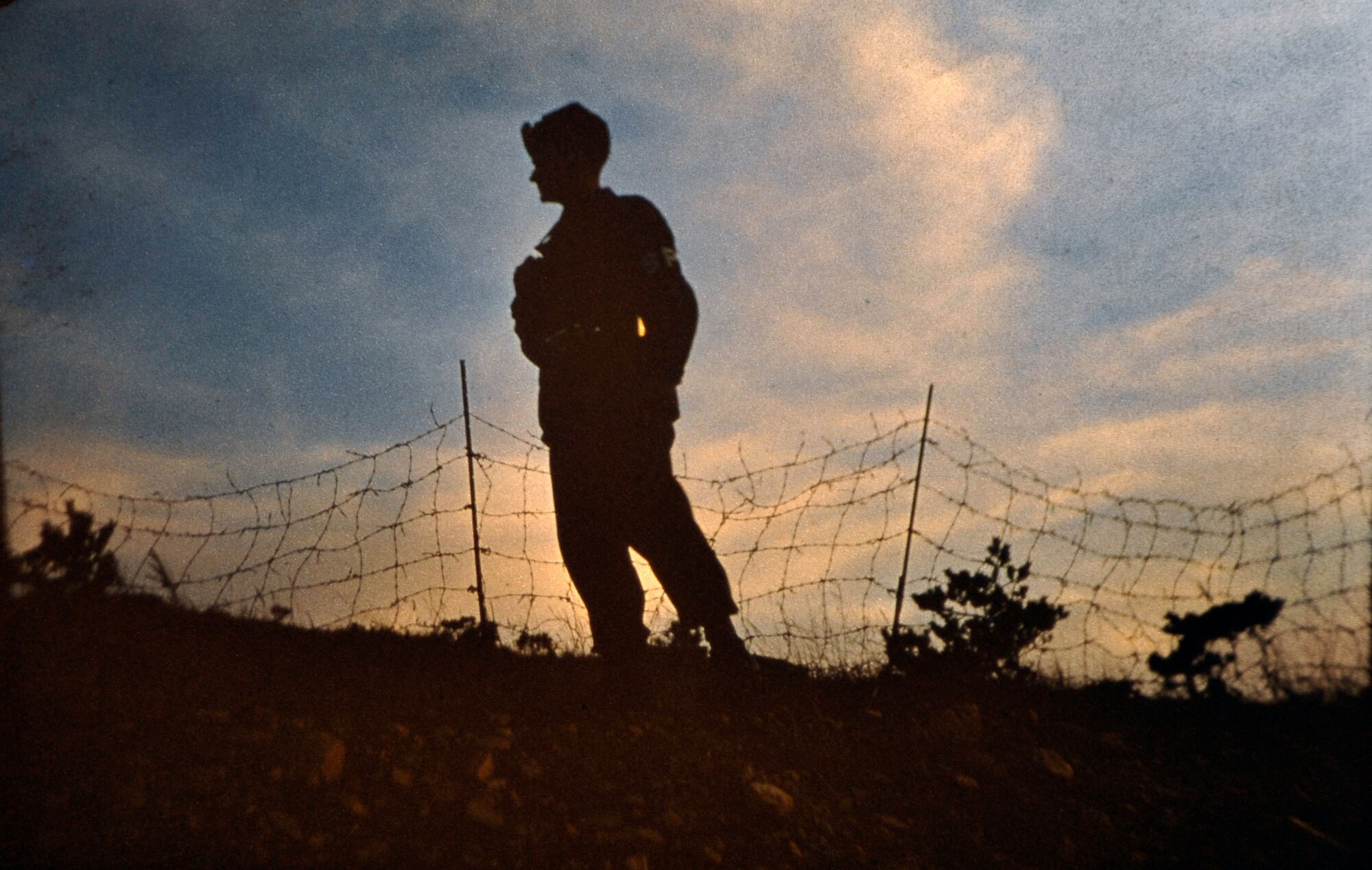 A guard patrols inside of a compound near the 38th parallel in South Korea. Retired U.S. Army Maj. E. Vernon Smith Jr. used photography as a way to preserve memories of his experience during his rotation there from 1956-58. (Courtesy photo/Released) 