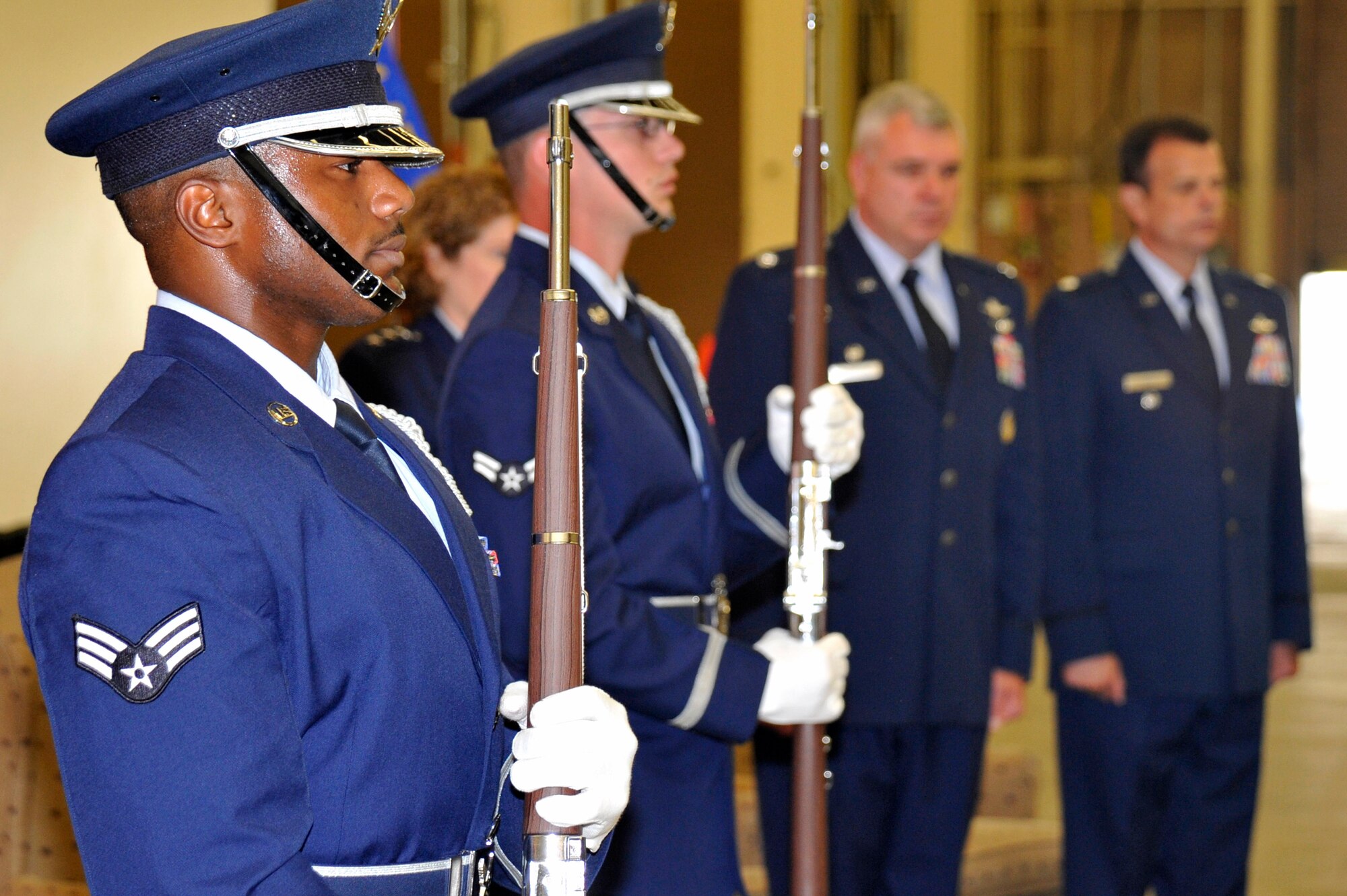 VANDENBERG AIR FORCE BASE, Calif. -- Members of the Vandenberg Honor Guard post the colors during a change-of-command ceremony here July 9, 2013, for the 614th Air and Space Communications Squadron. Lt. Col. Timothy Ryan assumed command of the 614th ACOMS from Lt. Col. Robert Thompson. (U.S. Air Force photo/Michael Peterson)