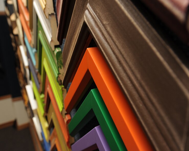 Frames hang on display for customers at the frame shop on Barksdale Air Force Base, La., July 23, 2013. The 2nd Force Support Squadron frame shop offers a variety of sizes ranging from 5x7 inch to 40x60 inch frames. (U.S. Air Force photo/Senior Airman Sean Martin)