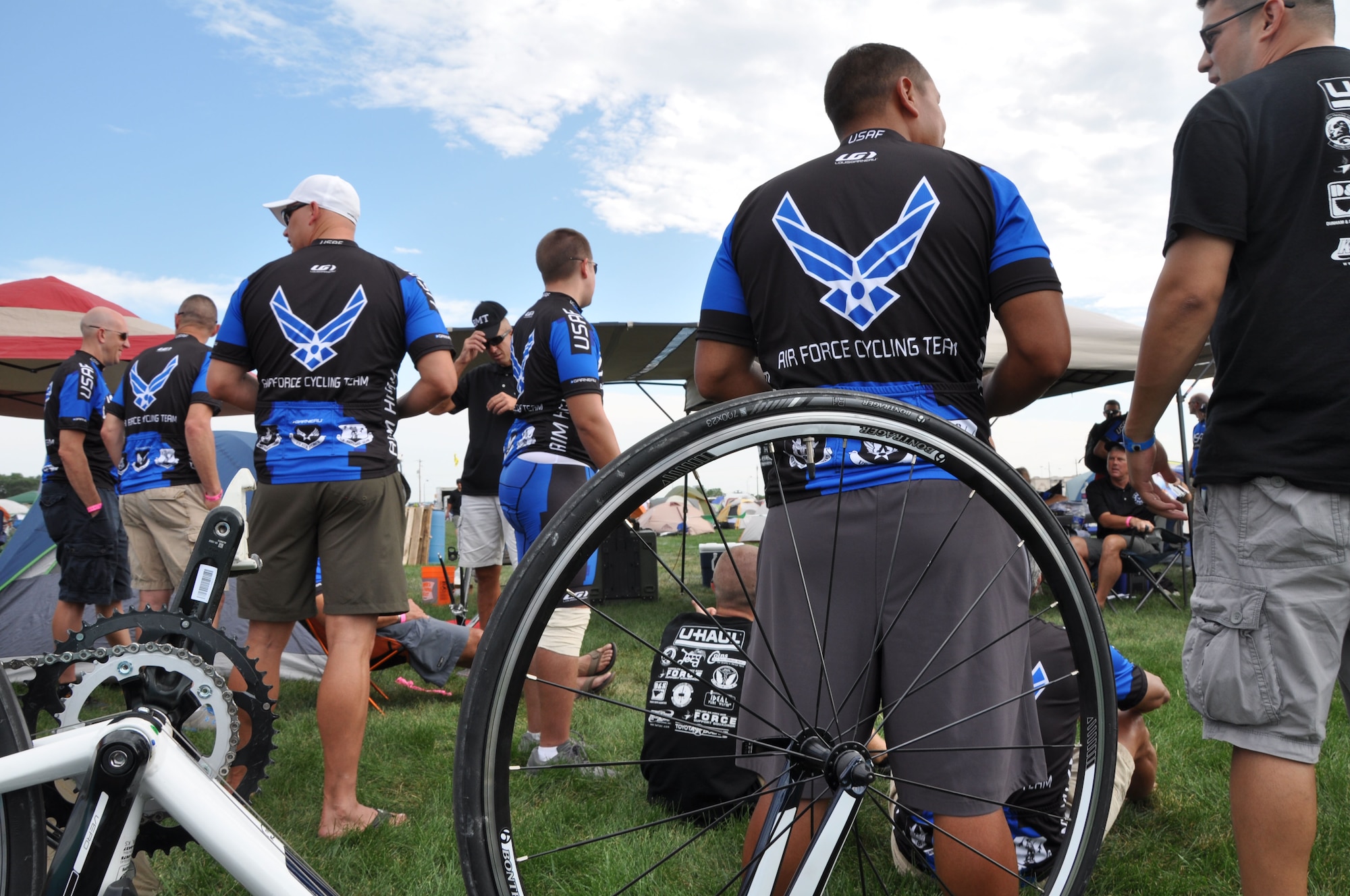 Air Force members gather the day before the Register's Annual Great Bicycle Ride Across Iowa at Council Bluffs, Iowa, July 20, 2013. For the Air Force, the RAGBRAI gives Airmen a chance to showcase the service's fitness culture and recruit for enlisted and civilian positions in the Reserve, guard and active duty. This is the 19th year the Air Force has participated in the event. (U.S. Air Force photo by Staff Sgt. Abigail Klein)