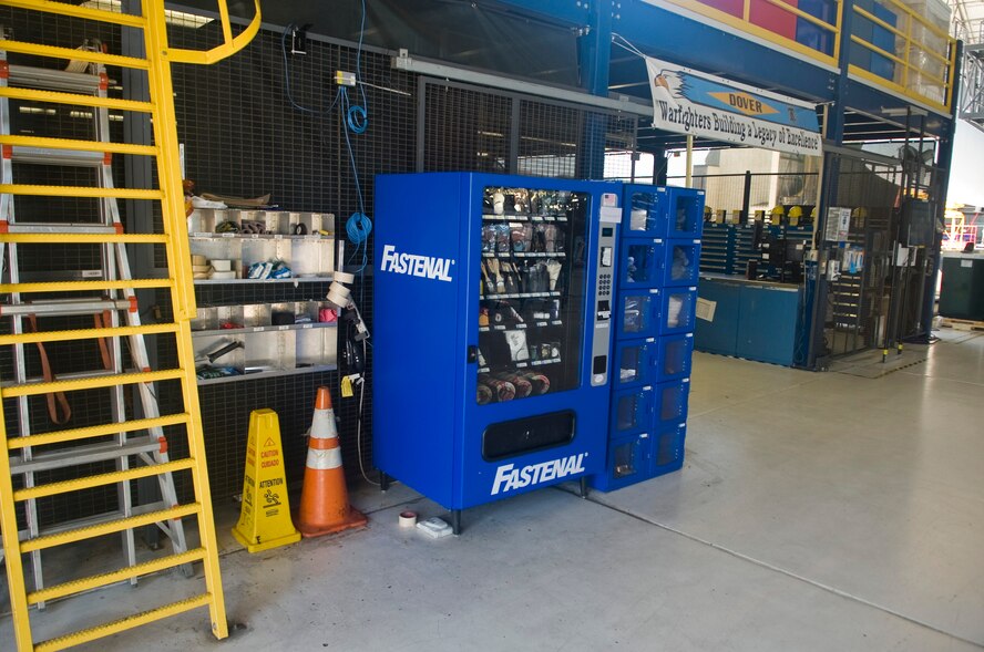A vending machine sits in the isochronal maintenance dock July 19, 2013, at Dover Air Force Base, Del.  These vending machines are stocked with equipment commonly used by the ISO dock to speed up the time gear issued. (U.S. Air Force photo/Senior Airman Jared Duhon) 