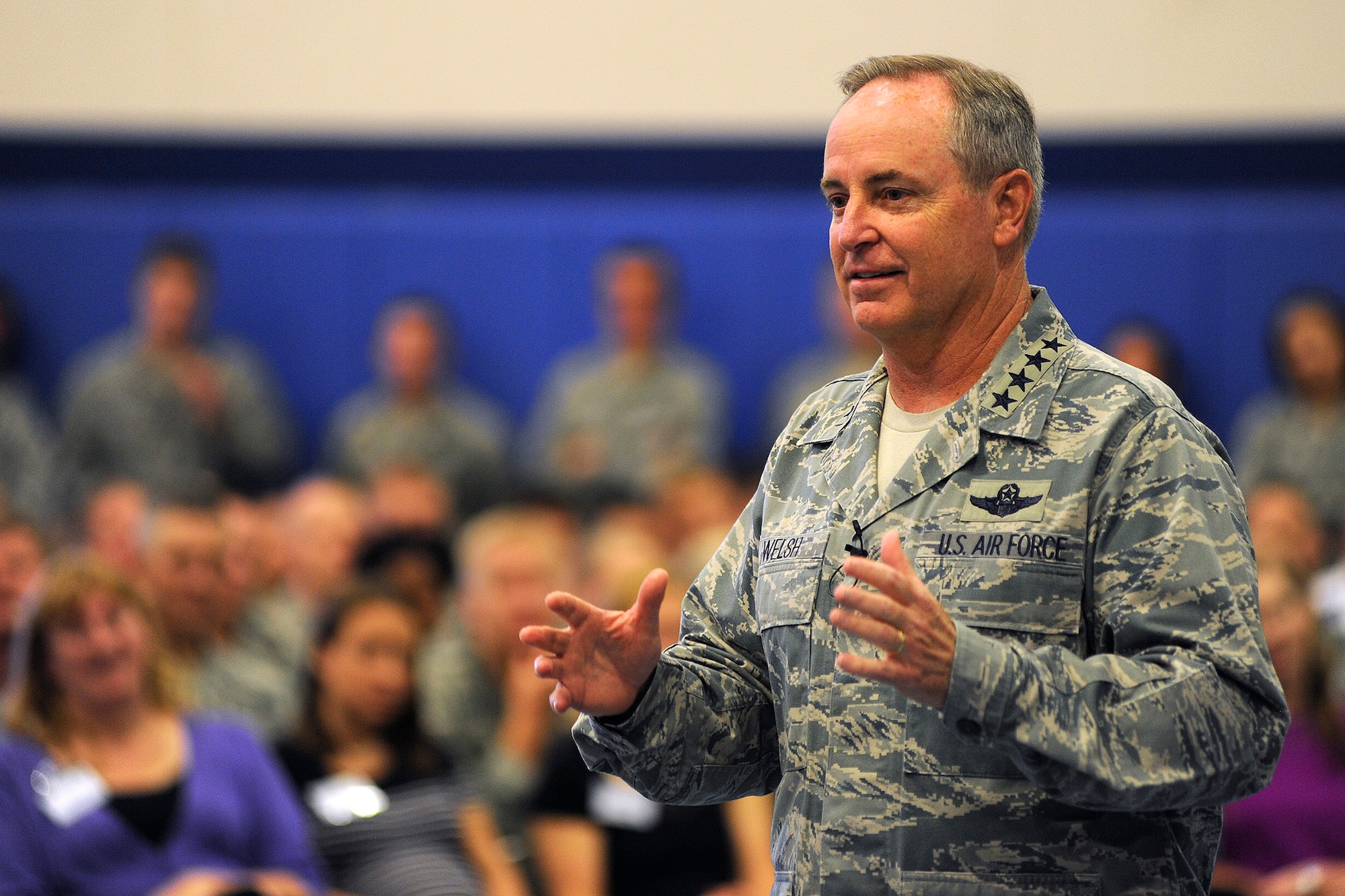 Air Force Chief of Staff Gen. Mark A. Welsh III talks to the Schriever Air Force Base men and women during an Airman’s call July 19, 2013.  As part of a two-day visit to Colorado Springs, the chief and his wife, Betty, thanked Airmen for their continued service and dedication, and addressed issues concerning Airmen and their families. (U.S. Air Force photo/Dennis Rogers)