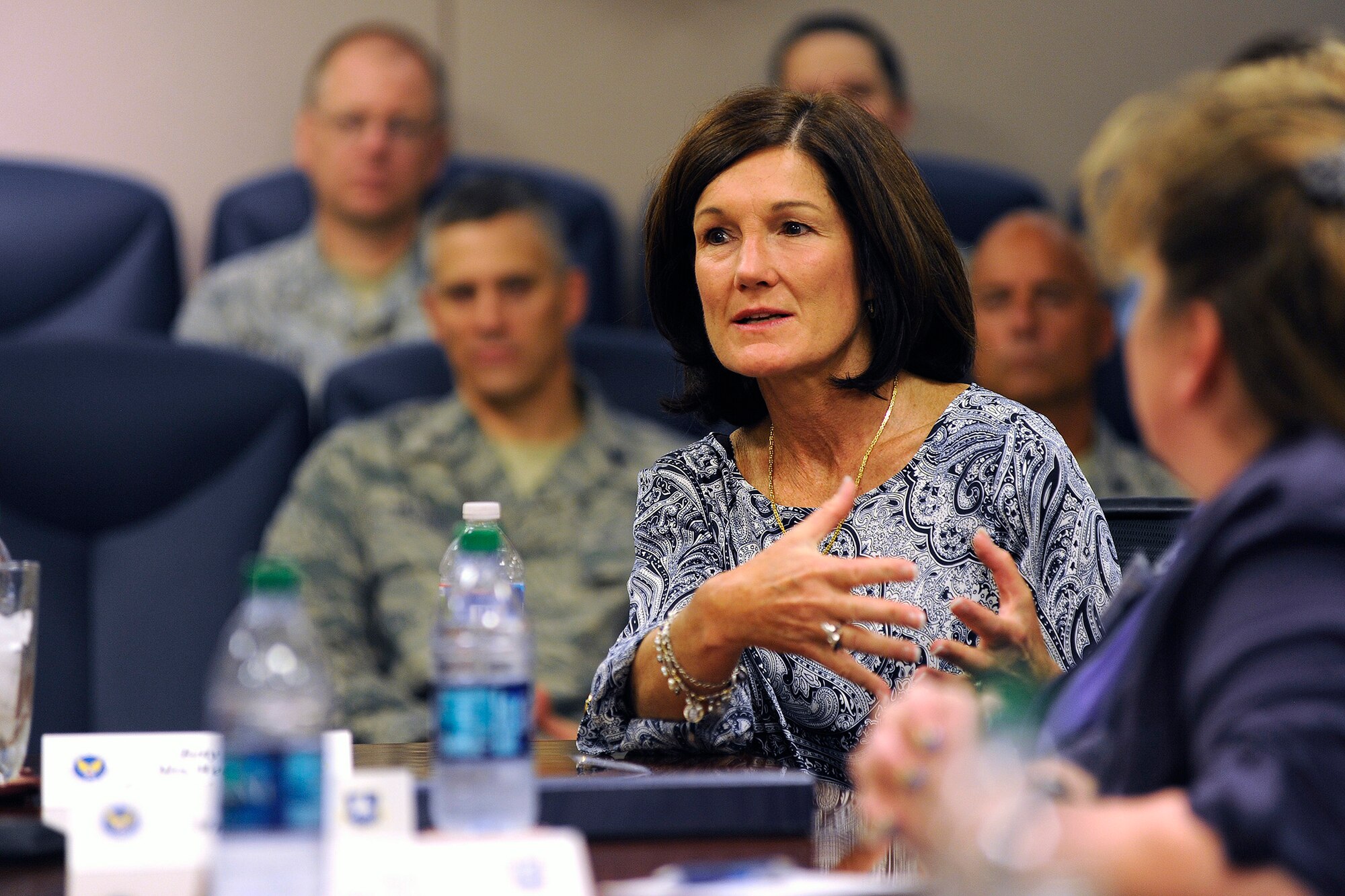Betty Welsh, wife of Air Force Chief of Staff Gen. Mark A. Welsh III, discusses the importance of key spouses during a meeting with wing leadership and spouses July 19, 2013, at Schriever Air Force Base. As part of a two-day visit to Colorado Springs, the Chief and his wife thanked Airmen for their continued service and dedication, and addressed issues concerning Airmen and their families. (U.S. Air Force photo/Dennis Rogers)