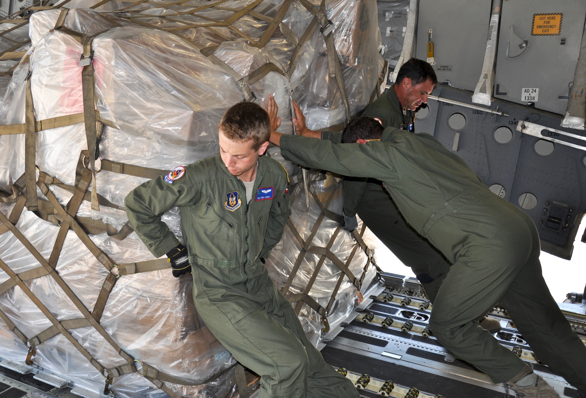 Members of the 315th Airlift Wing from Joint Base Charleston, S.C. delivered 86,200 pounds of humanitarian aid to El Salvador and Haiti on a training mission this weekend.  (U.S. Air Force photo by Maj. Wayne Capps)