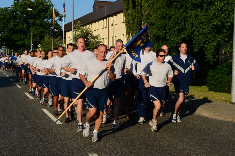 SPANGDAHLEM AIR BASE, Germany – U.S. Air Force Airmen call out cadences during a run July 19, 2013. The event was the first base-wide jody run and was put on by the First Four private military organization. (U.S. Air Force photo by Airman 1st Class Kyle Gese/Released)