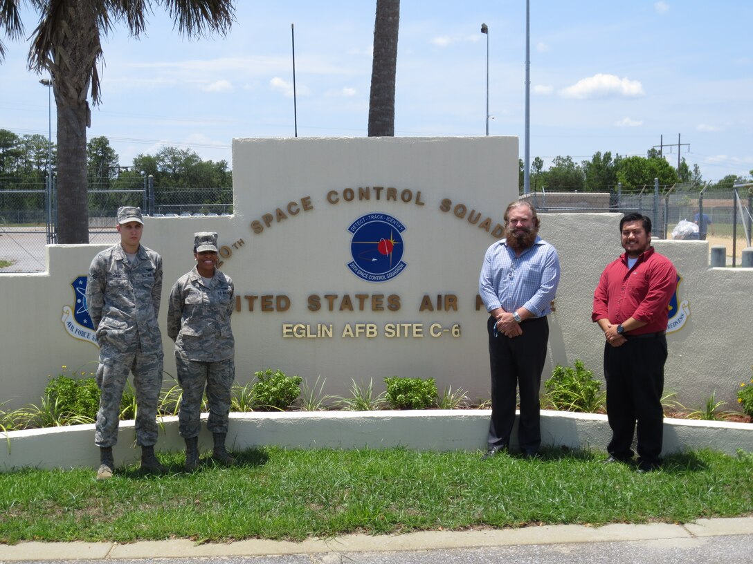 EGLIN AFB, Fla. -- A team of personnel from both Eglin Air Force Base and RAF Fylingdales was named the May Gold Knight award recipient. Pictured (left to right) are Senior Airman Kaleb Gage, 2nd Lt. Celeste Crenshaw, Kevin McKinion and Mark Starnes from Eglin AFB. The team introduced an operator and analyst exchange program to share technical discussions and procedures. (U.S. Air Force photo)