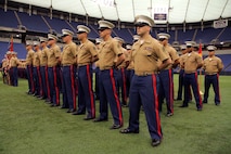 Marines with Recruiting Station Twin Cities listen to Maj. Kenneth Gawronski reflect on his time as the commanding officer during a change of command ceremony at Mall of America Field inside the Metrodome. For additional imagery from the event visit www.facebook.com/rstwincities.