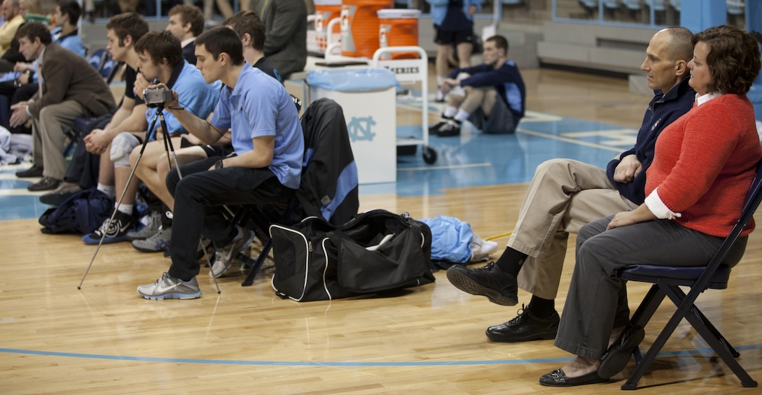 Brig. Gen. Thomas Gorry, commanding general of Marine Corps Installations East – Marine Corps Base Camp Lejeune and his wife watch the University of North Carolina at Chapel Hill’s wrestling team during Military Appreciation Night at the school Feb. 8. Gorry attended to watch his alumni wrestle and also be recognized for his accomplishments at the school. UNC competed against Virginia Military Institute and tension was high as the team wrestled in front of a home crowd.