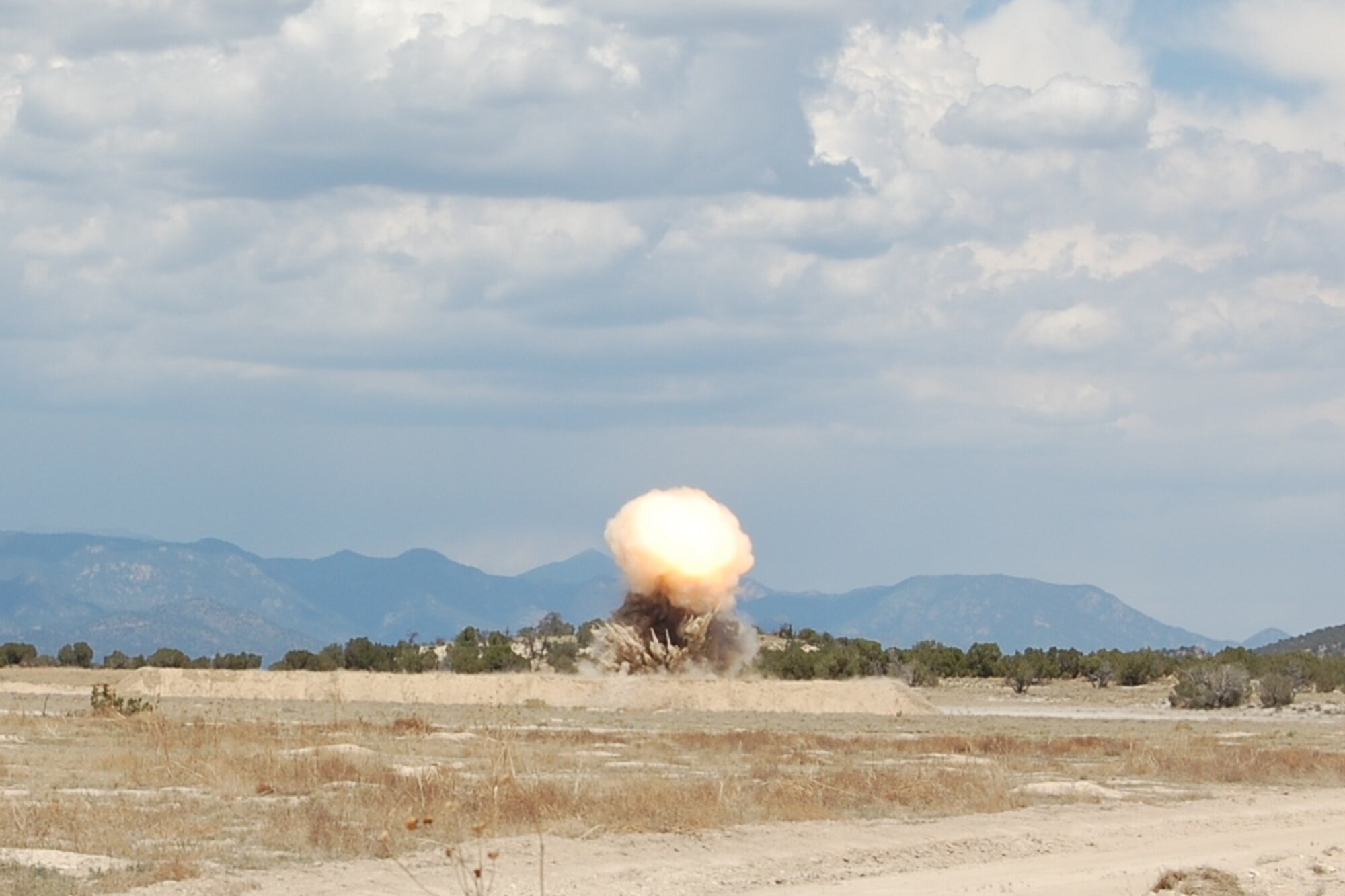 The 140th Explosive Ordnance Disposal Flight members built and detonated several explosives during the EOD Demo Day July 12, 2013 at Airburst Range, Fort Carson, Colo. as part of their routine training requirements. (U.S. Air National Guard photo by Capt. Kinder Blacke)