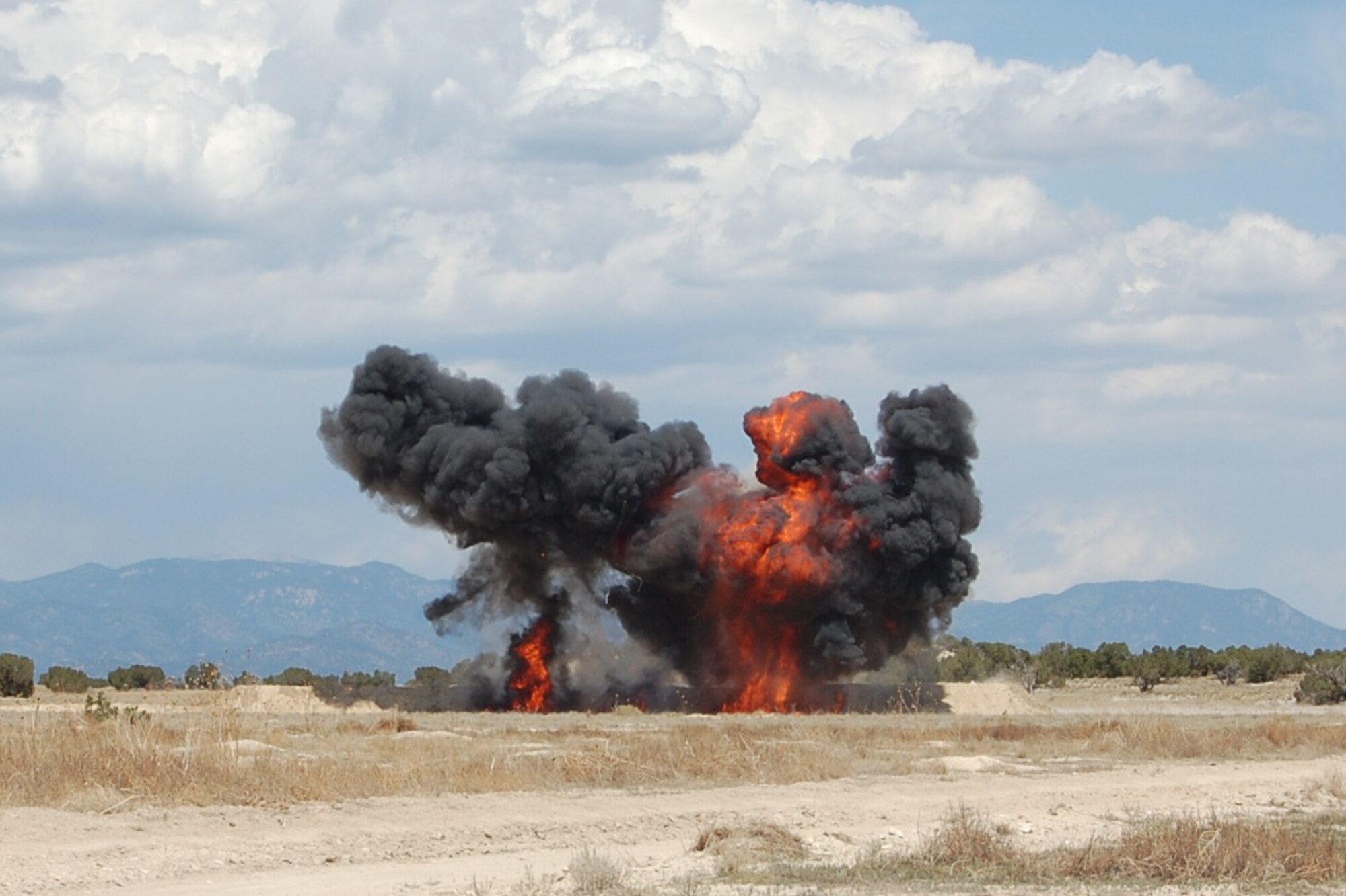The 140th Explosive Ordnance Disposal Flight members built and detonated several explosives during the EOD Demo Day July 12, 2013 at Airburst Range, Fort Carson, Colo. as part of their routine training requirements. (U.S. Air National Guard photo by Capt. Kinder Blacke)