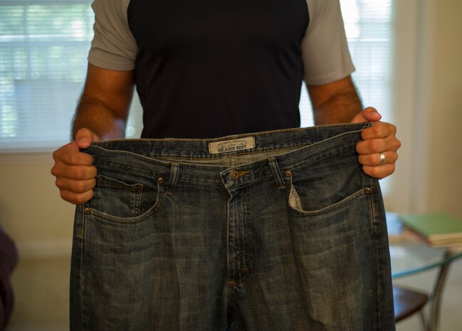 Senior Airman Jared Trimarchi, 628th Air Base Wing Public Affairs photo-journalist, weighed more than 250 pounds when he began his road to fitness, and today has lost 62 pounds and continues to work out, eat healthy and help others reach their goals. (U.S. Air Force photo /Senior Airman Melissa Goslin)