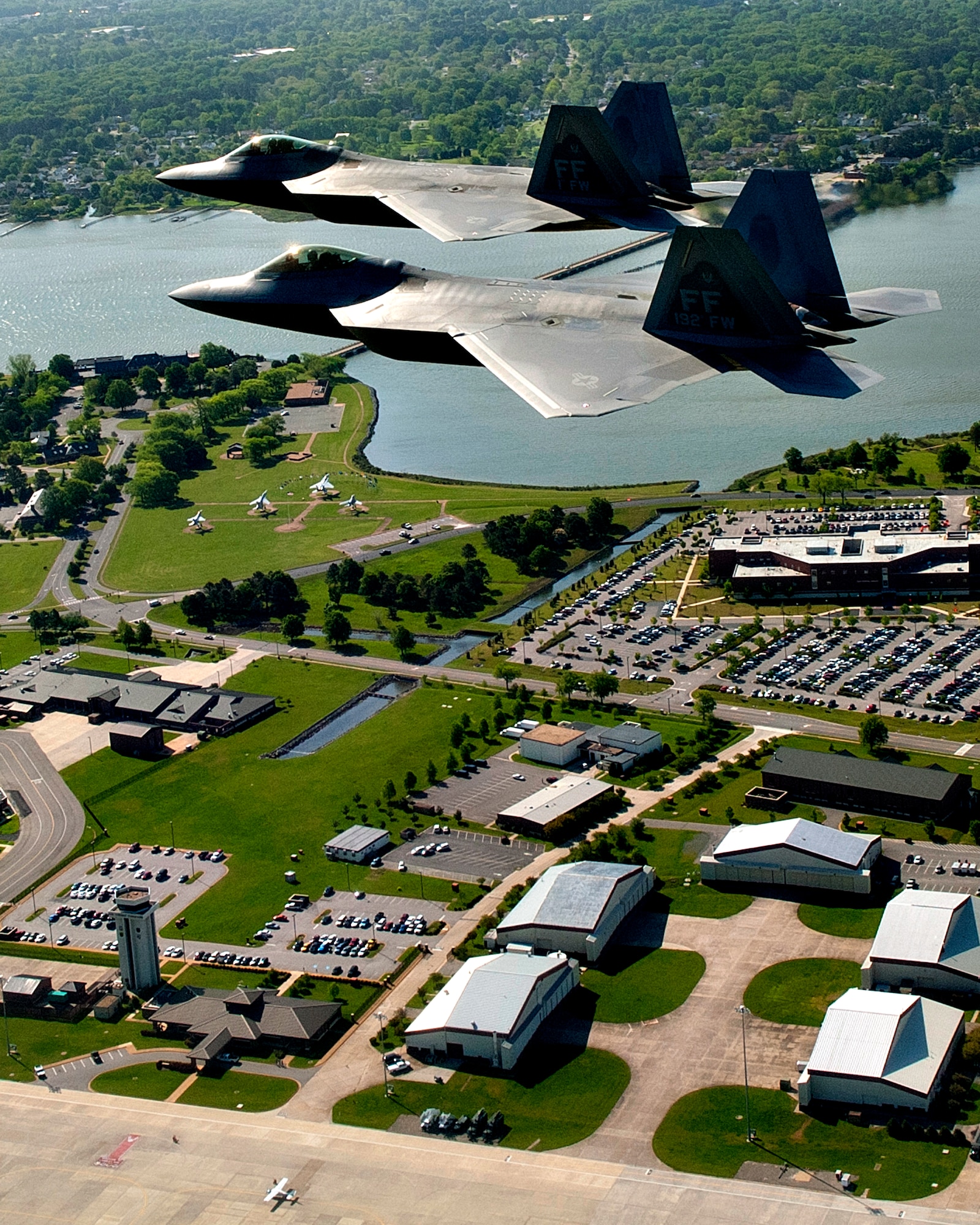 U.S. Air Force and Navy units participated in the Trident Warrior 2013 exercise over the Atlantic Ocean near the Hampton Roads, Va., area, July 8-19. The exercise tested an experimental Joint Tactical Information Distribution System between fourth and fifth-generation fighters, and included F-22 Raptors, F-15 Eagles, F-15 Strike Eagles, F-18 Hornets, T-38 Talons and E-2 Hawkeyes. (U.S. Air Force photo by Staff Sgt. John D. Strong II / Released)